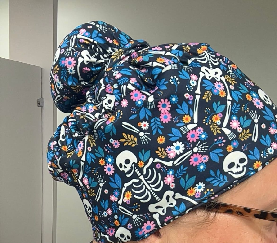 Customer photo review of CloudCaps Scrub Cap | Skeleton Flowers