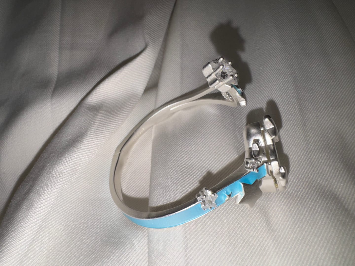 Customer photo review of "WISHING STAR" Rhodium Plated Wishing Star Flip Bangle, Zirconia Glass