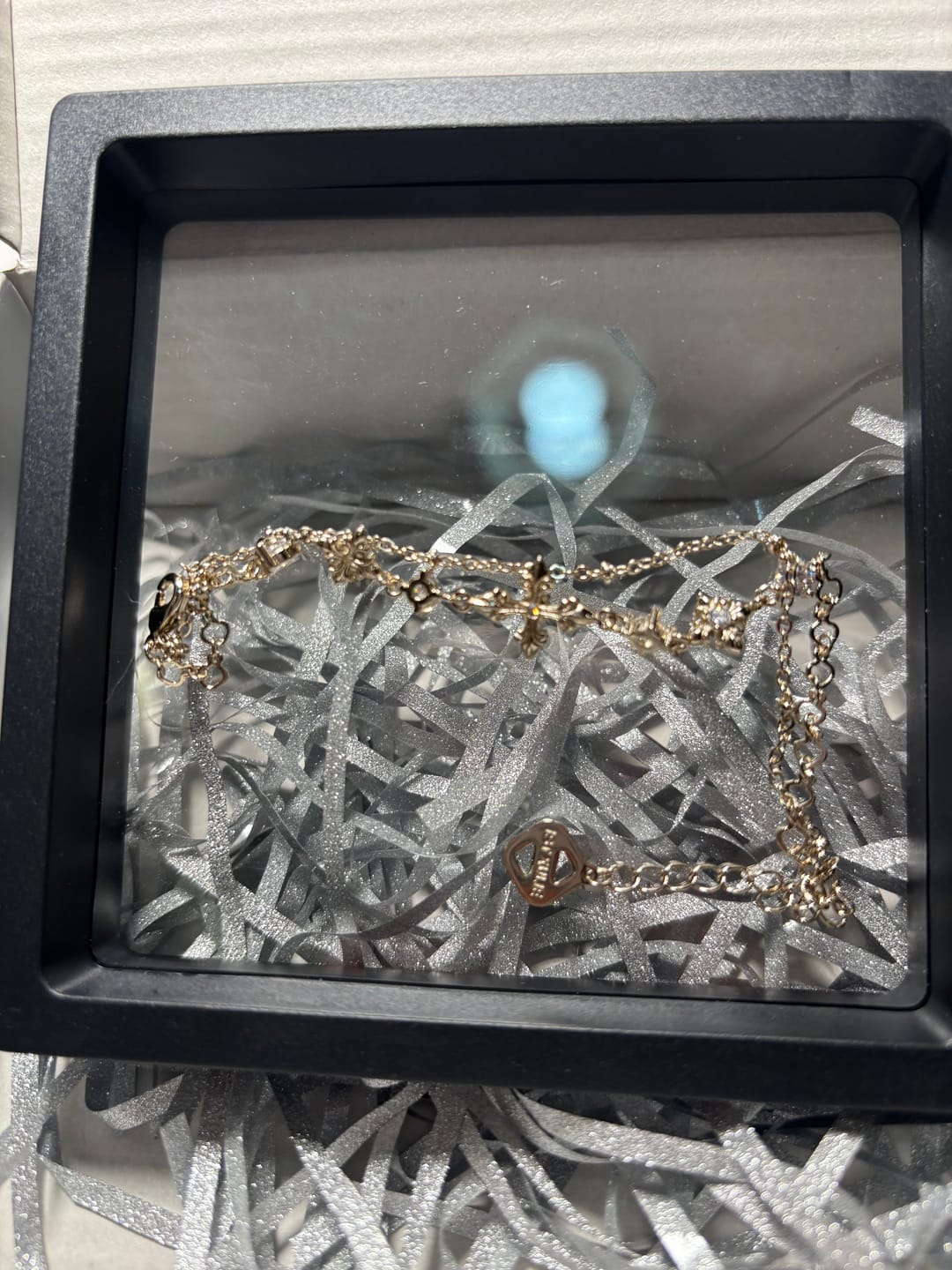 Customer photo review of "Bastet" 14K Gold Plated Layered Iris Zirconia Charm Bracelet