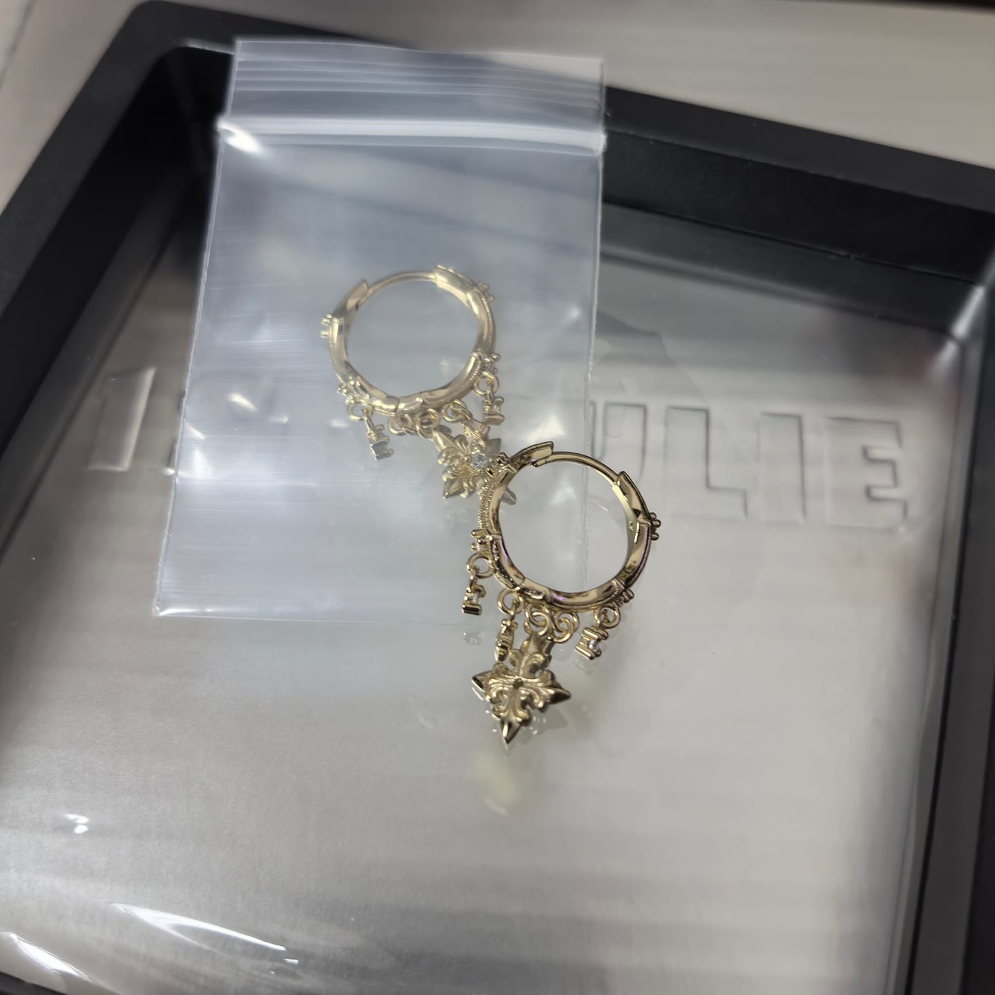 Customer photo review of "Bastet" Iris Fringe Drop Dangle Hoop Earrings