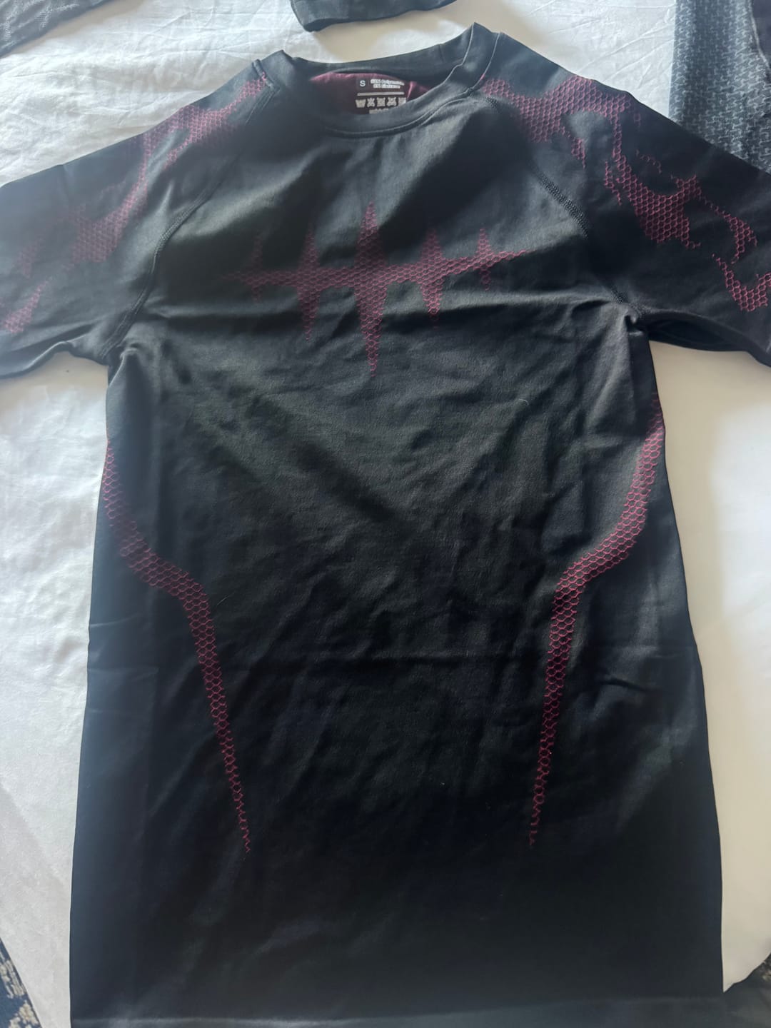 Customer photo review of Anti Magic Compression Tee