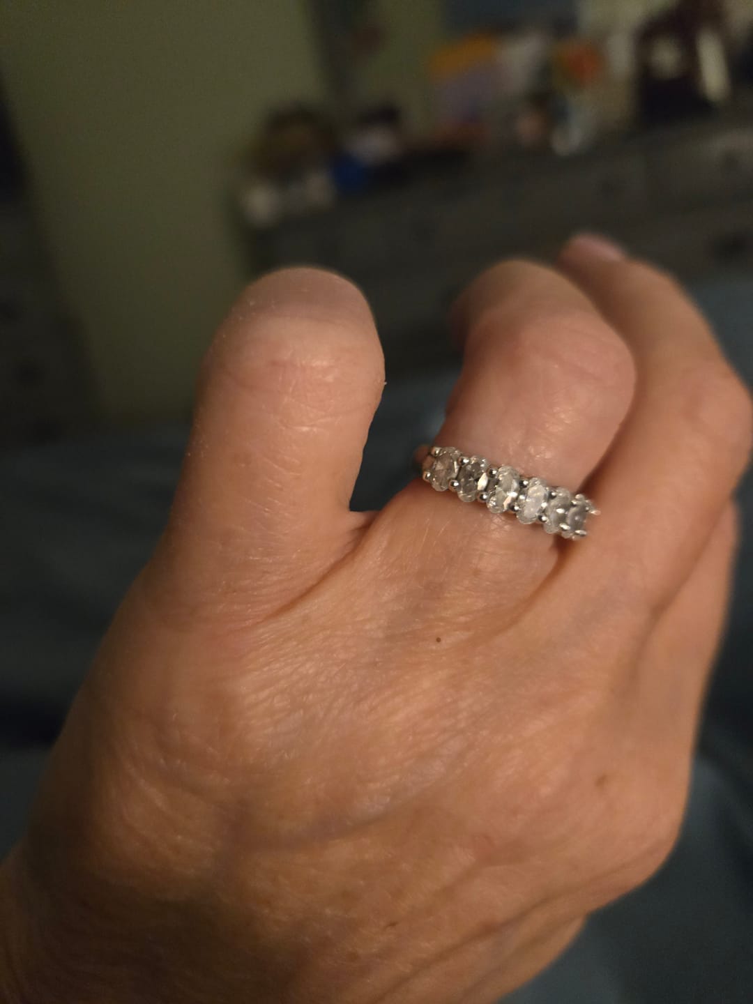 Customer photo review of Seven Stone Oval Cut Moissanite Half Eternity Wedding Band Ring
