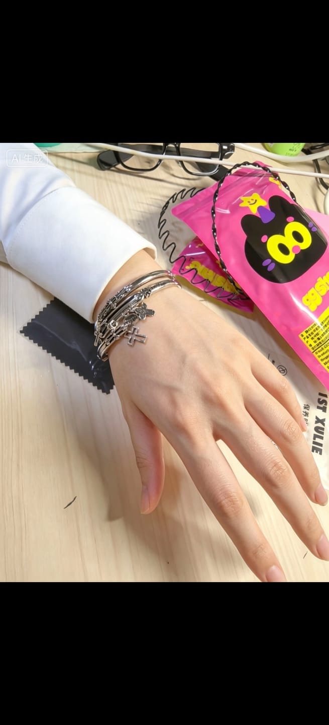 Customer photo review of "Irises" Rhodium Plated Vintage Oxidized Cross Cuff Bangle, Statement Cuff Bracelet