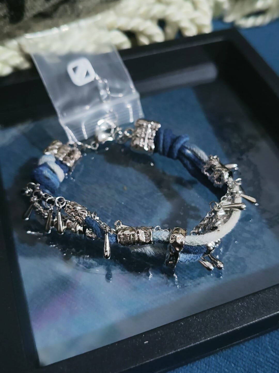 Customer photo review of "MIAO" Platinum Plated Ethnic Braided Tassel Bracelet, Statement Woven Handchain