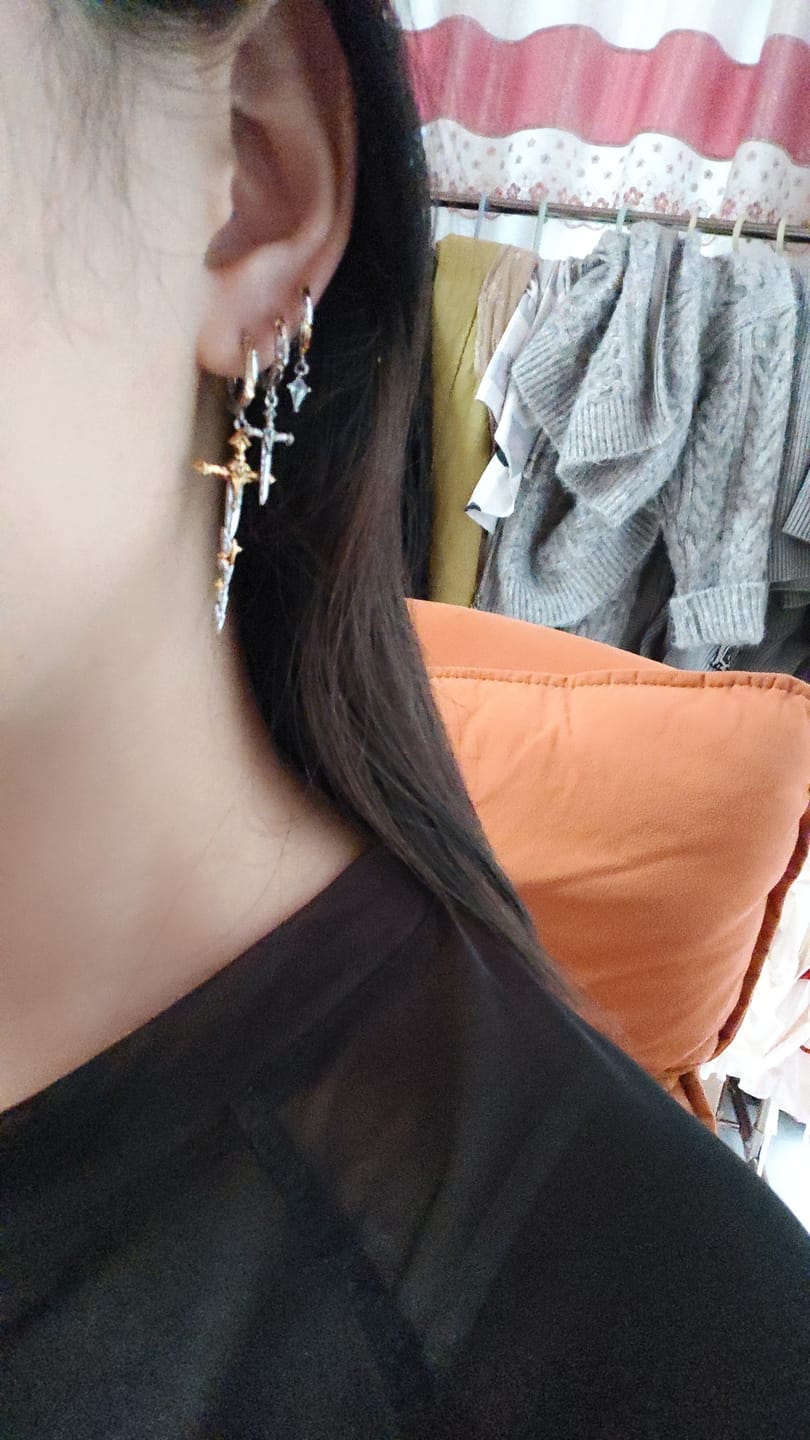 Customer photo review of "Knight's Oath" 18K Gold Plated Sword Dangle Hoop Earrings