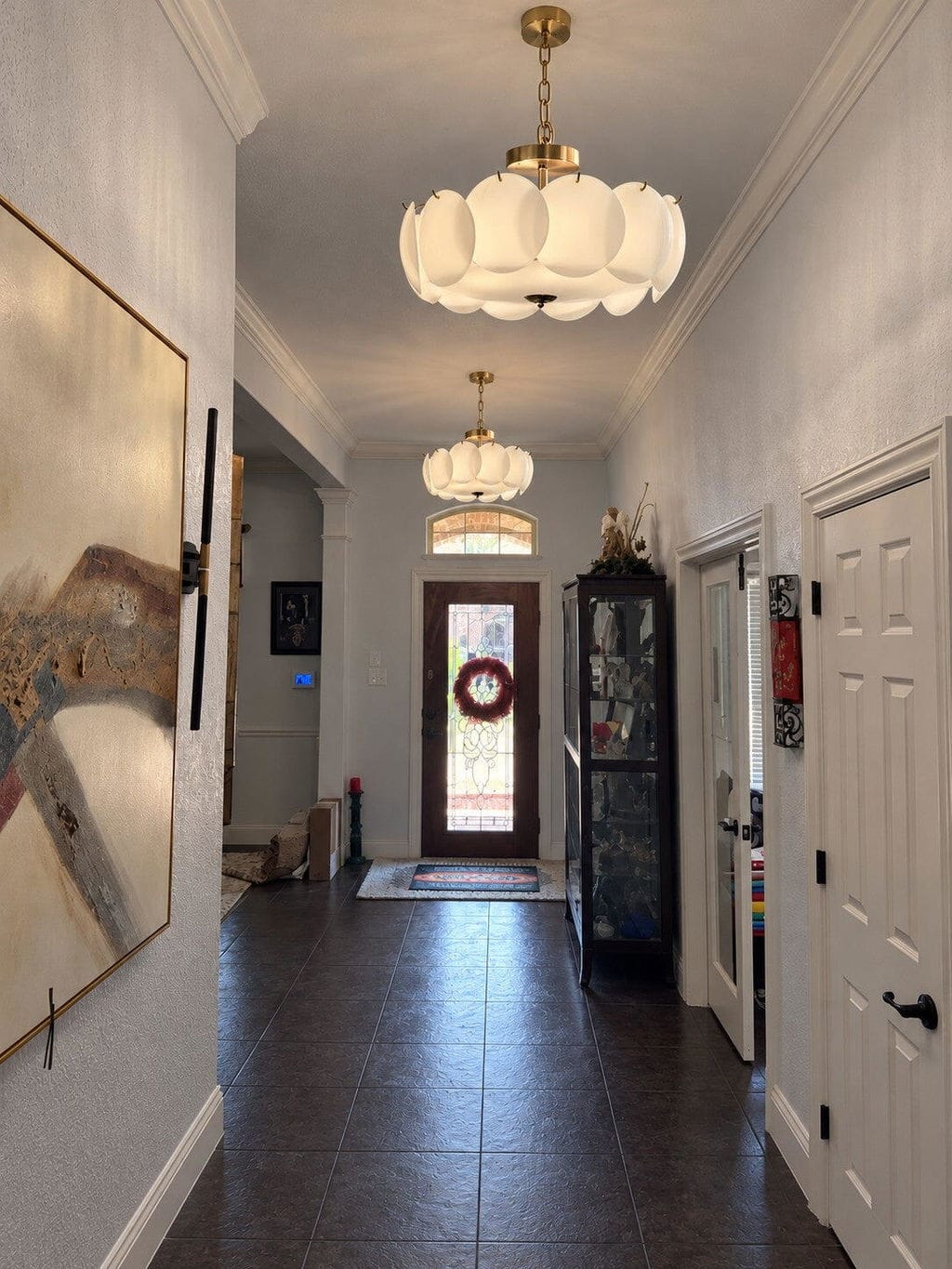 Customer photo review of Round Chandelier, Layered Glass Discs, Refined Iron Frame