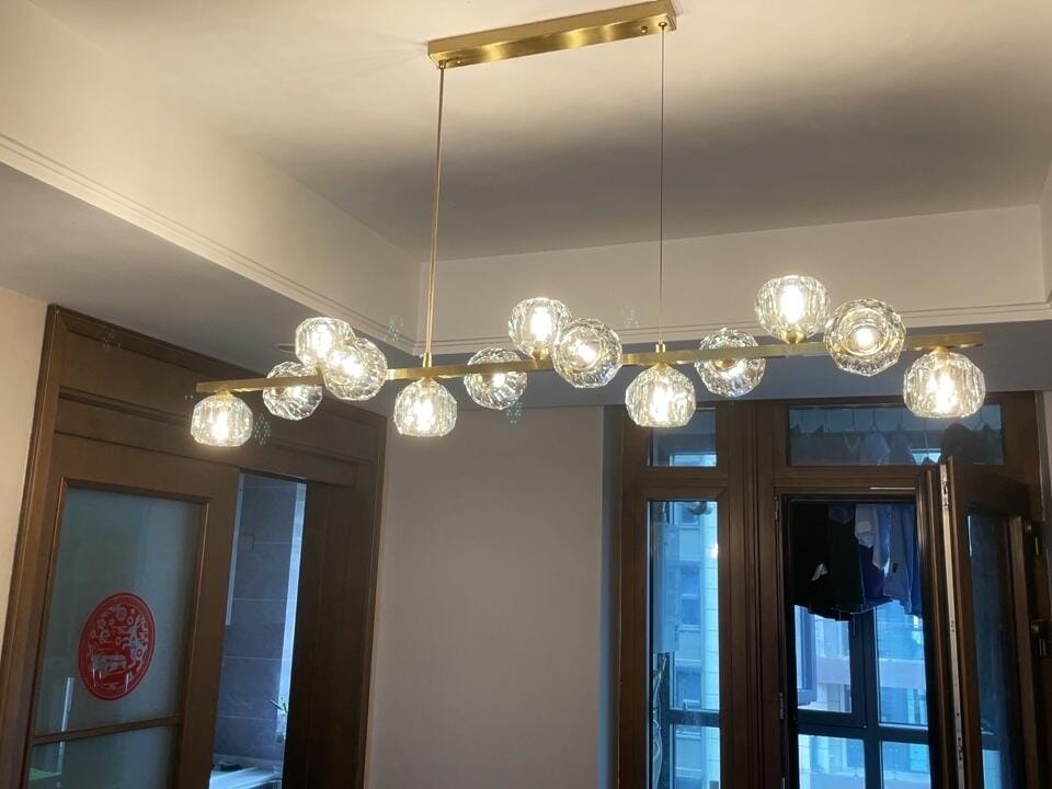 Customer photo review of Crystal Ball Chandelier, Linear Brass Bar, Adjustable Pendant Light