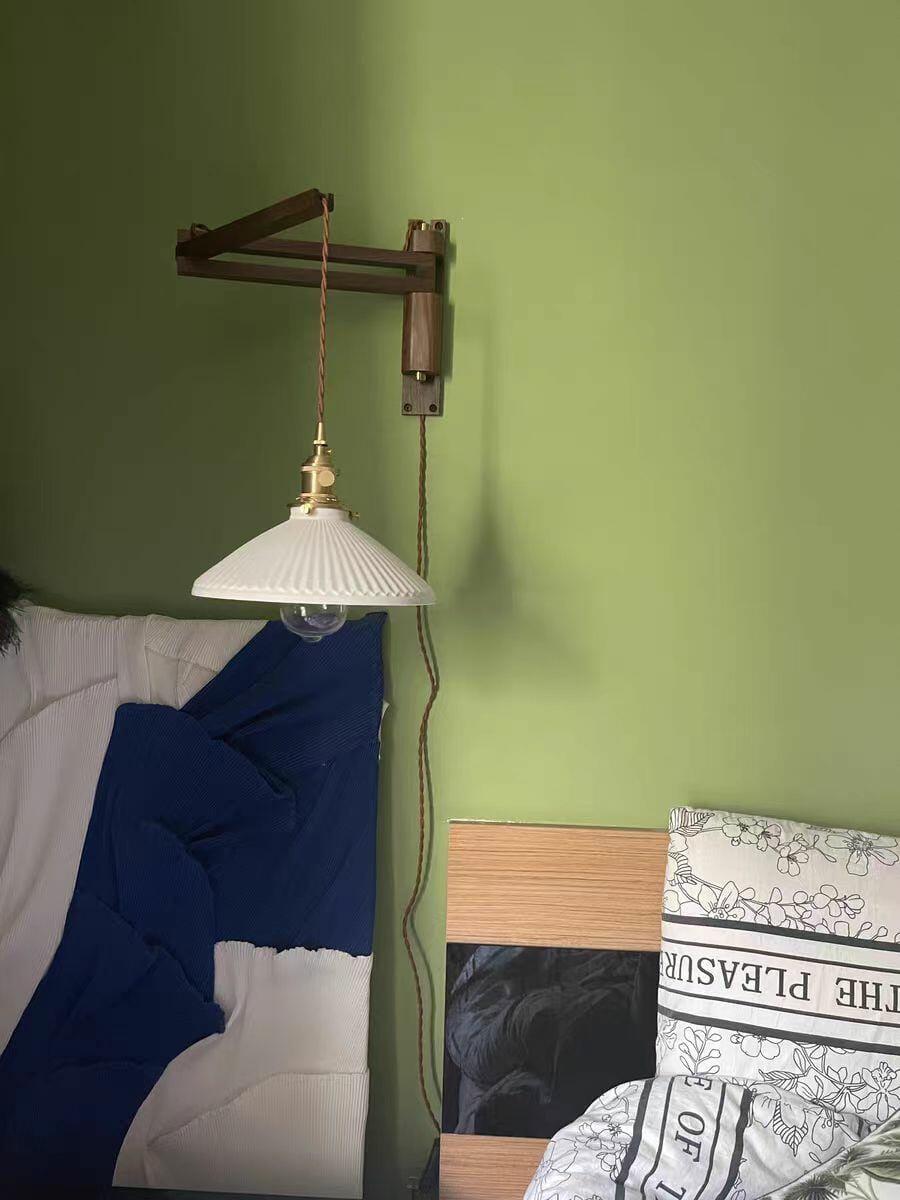 Customer photo review of Swing Arm Wall Light, Wood and Brass, Plug In Wall Sconce