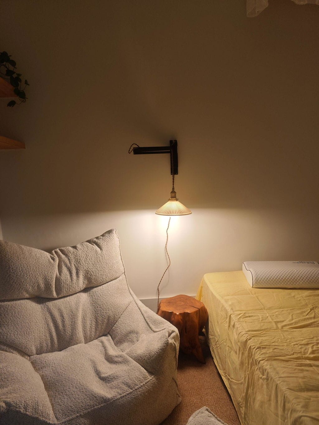 Customer photo review of Swing Arm Wall Light, Wood and Brass, Plug In Wall Sconce