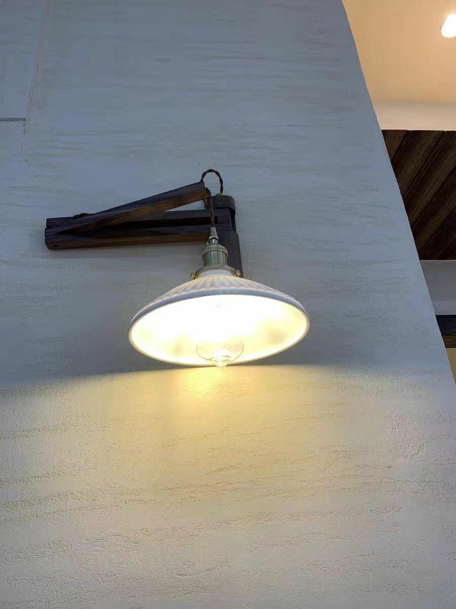 Customer photo review of Swing Arm Wall Light, Wood and Brass, Plug In Wall Sconce