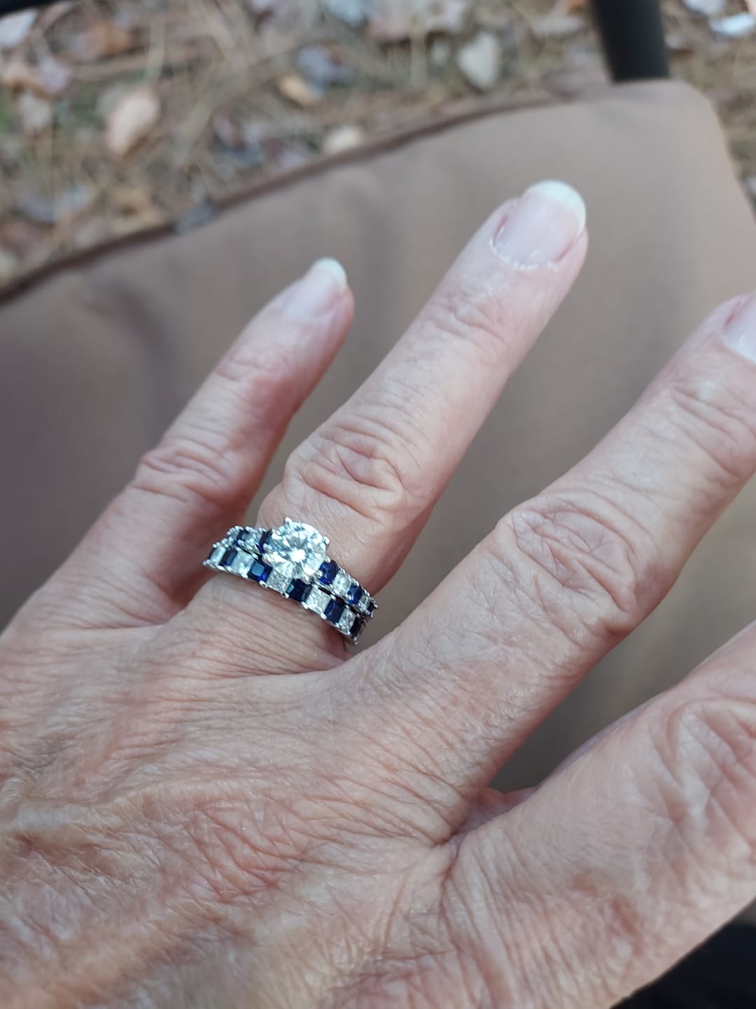 Customer photo review of Alternating Princess Moissanite And Sapphire Half Eternity Wedding Band Ring