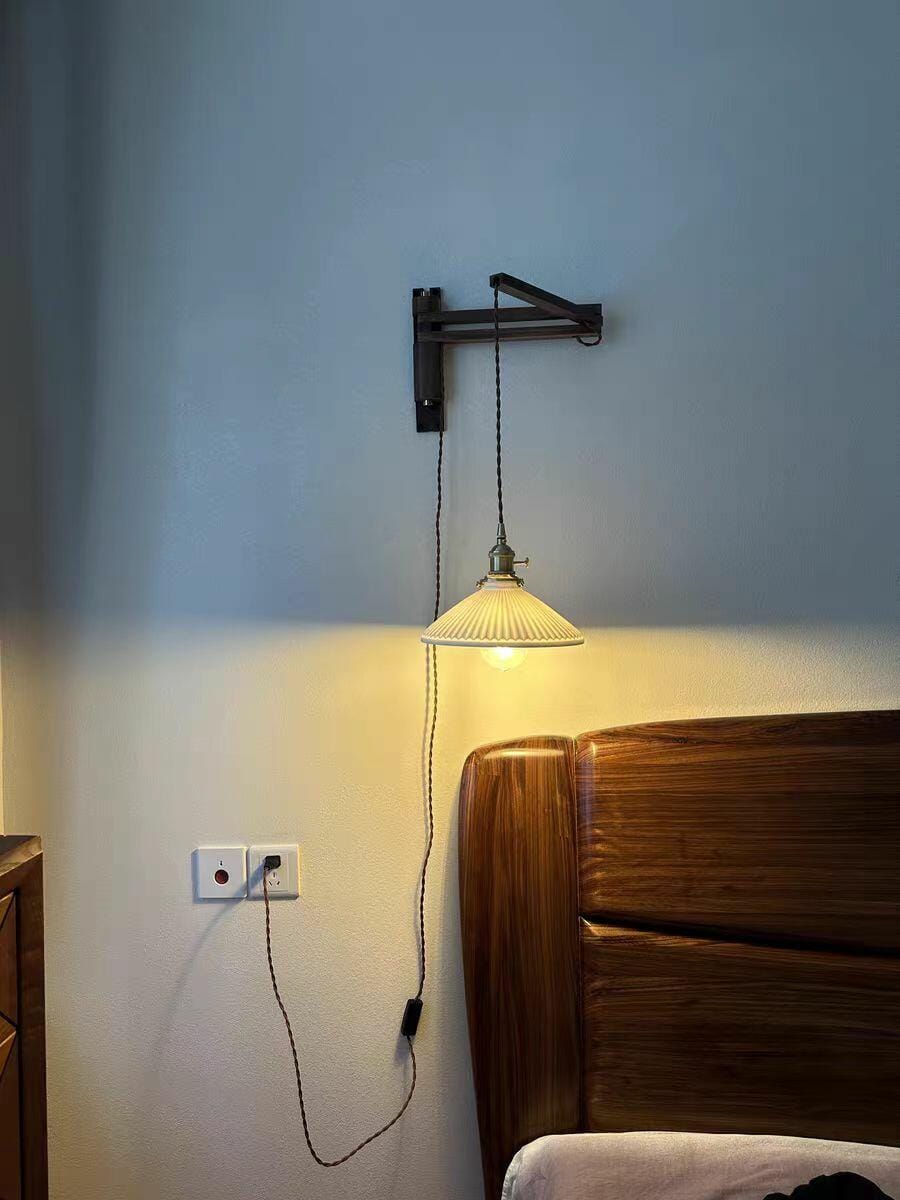 Customer photo review of Swing Arm Wall Light, Wood and Brass, Plug In Wall Sconce