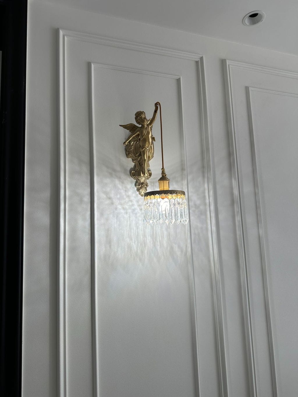 Customer photo review of Baroque Cherub Wall Light, Copper Finish, Clear Glass, Wall Sconce