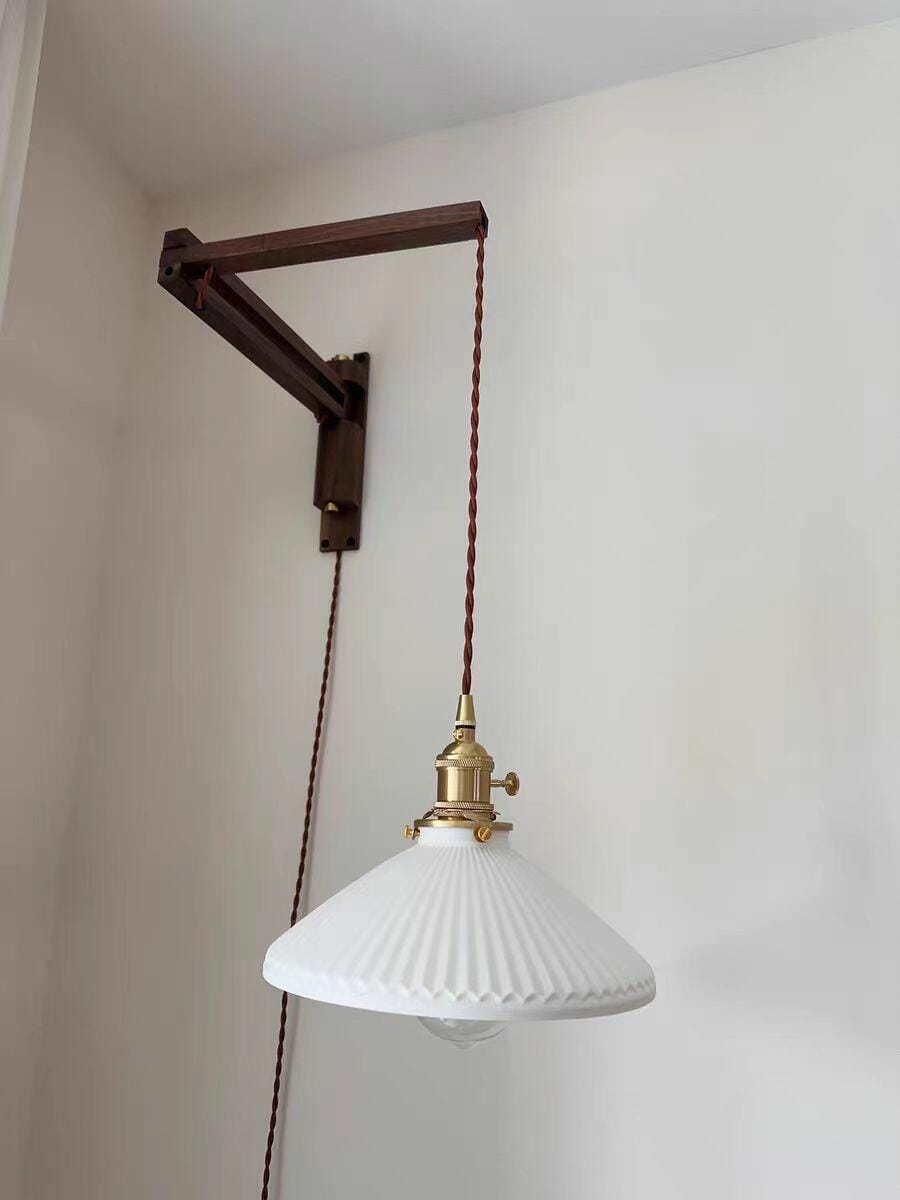 Customer photo review of Swing Arm Wall Light, Wood and Brass, Plug In Wall Sconce