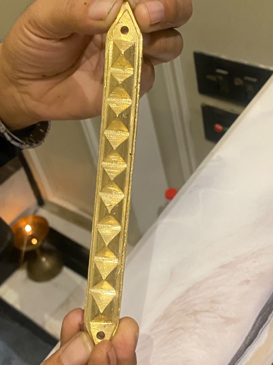 Customer photo review of 9 Pyramid Strips – Vastu Remedy for Door Threshold & Toilet Energy Blocking | Copper/Brass/Lead Door Corrections | 7 inches