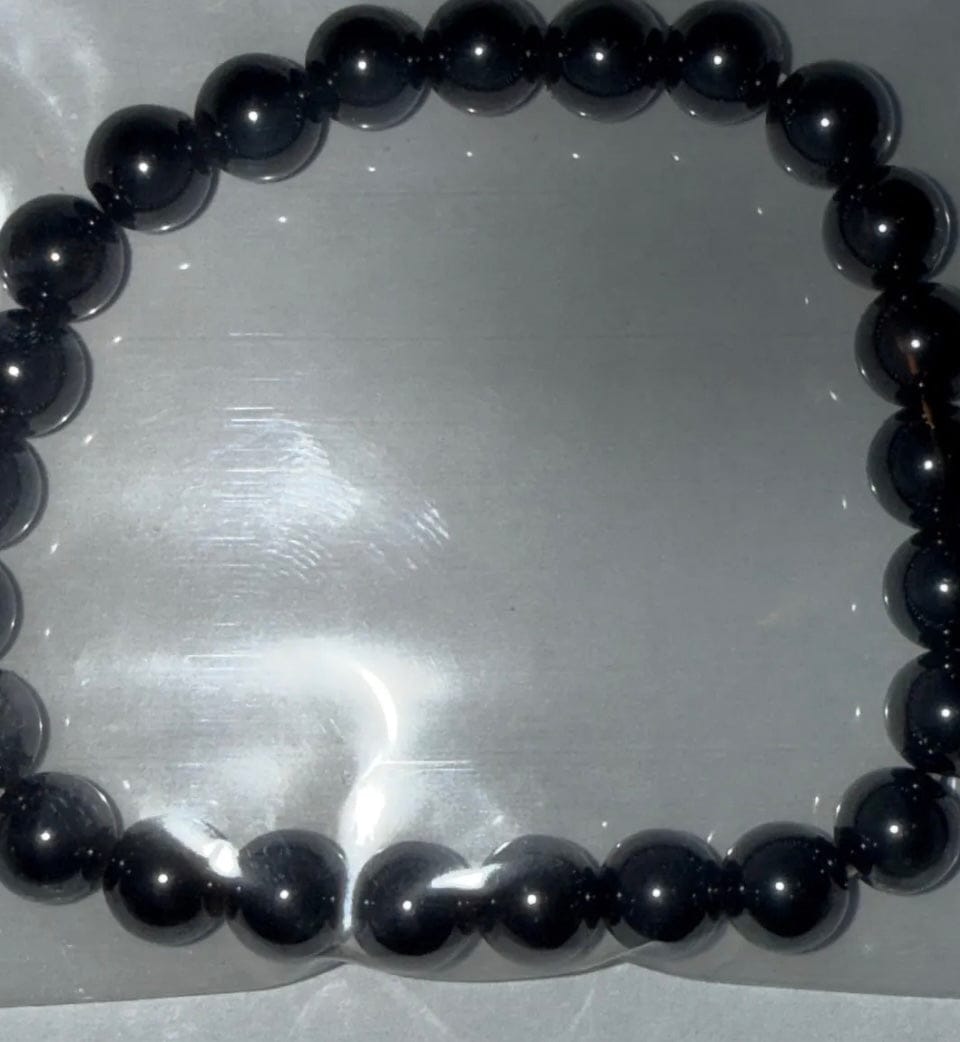Customer photo review of 6 8 10MM Magnetite Stone Bracelet: Unisex Stretch Bracelet
