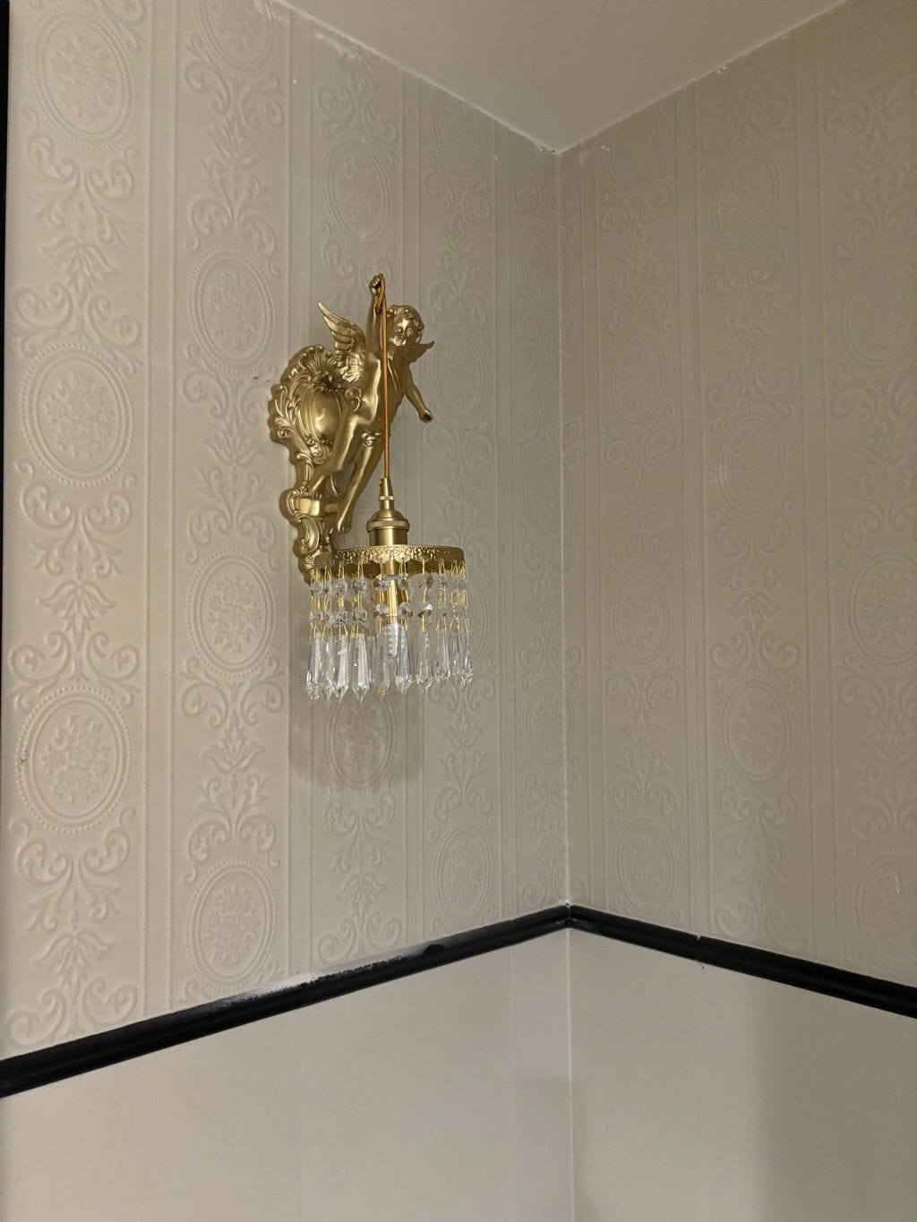 Customer photo review of Baroque Cherub Wall Light, Copper Finish, Clear Glass, Wall Sconce