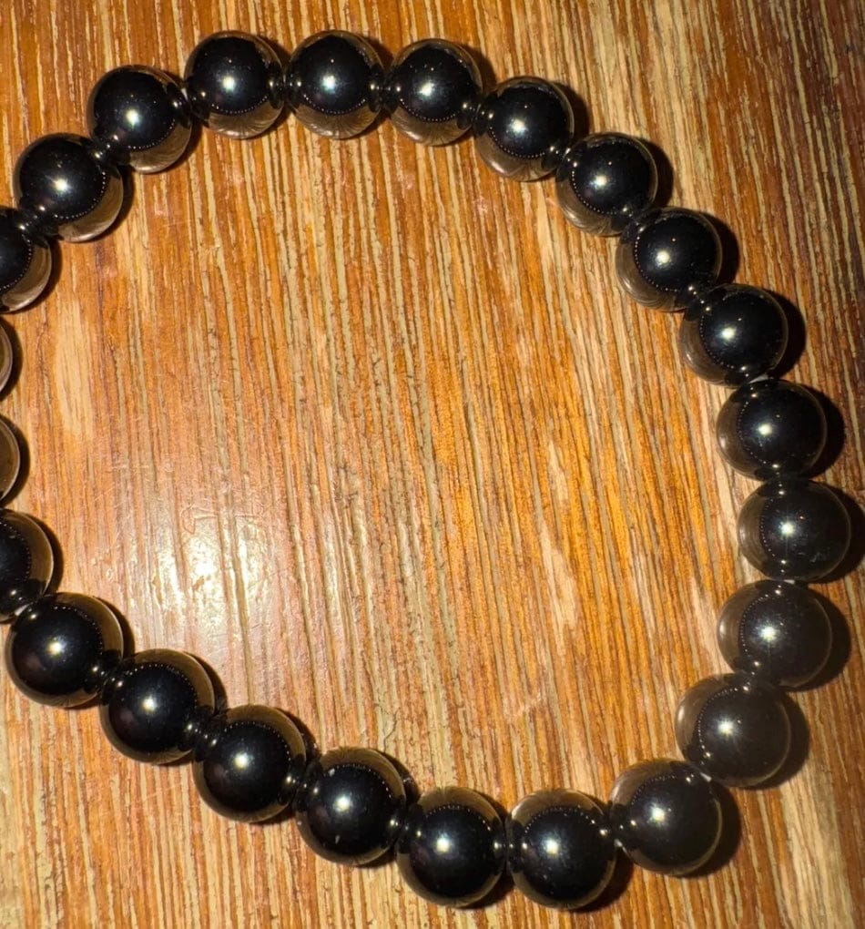 Customer photo review of 6 8 10MM Magnetite Stone Bracelet: Unisex Stretch Bracelet