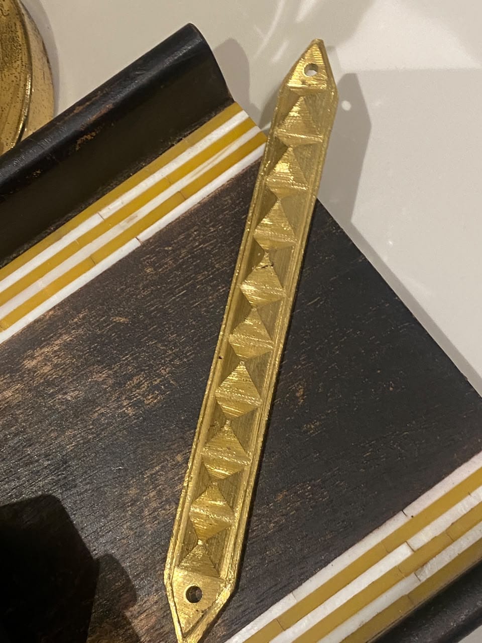 Customer photo review of 9 Pyramid Strips – Vastu Remedy for Door Threshold & Toilet Energy Blocking | Copper/Brass/Lead Door Corrections | 7 inches