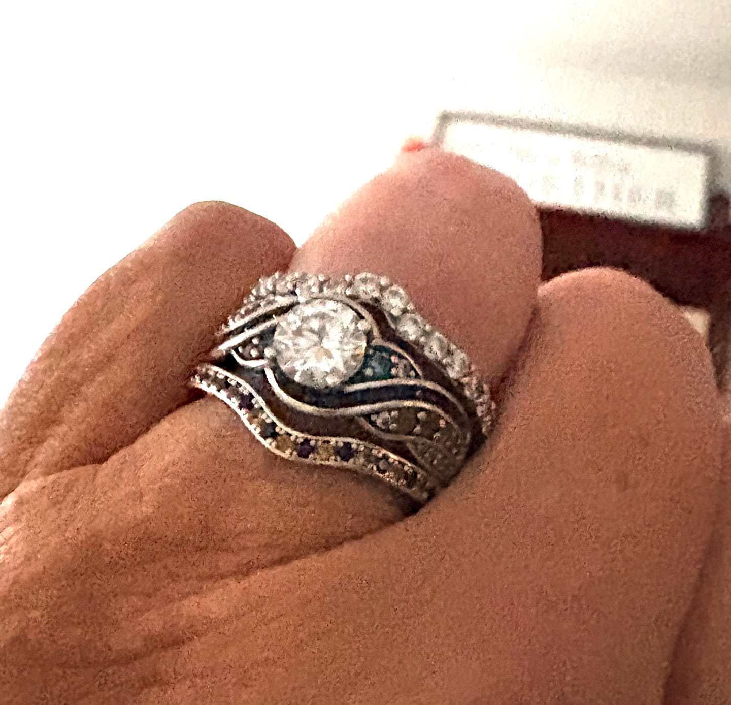 Customer photo review of Alternating Blue & Yellow Sapphire Curved Wedding Band Ring