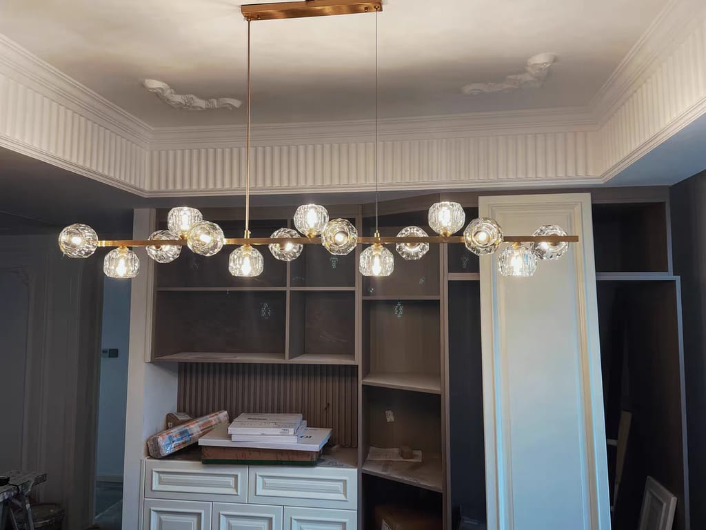 Customer photo review of Crystal Ball Chandelier, Linear Brass Bar, Adjustable Pendant Light