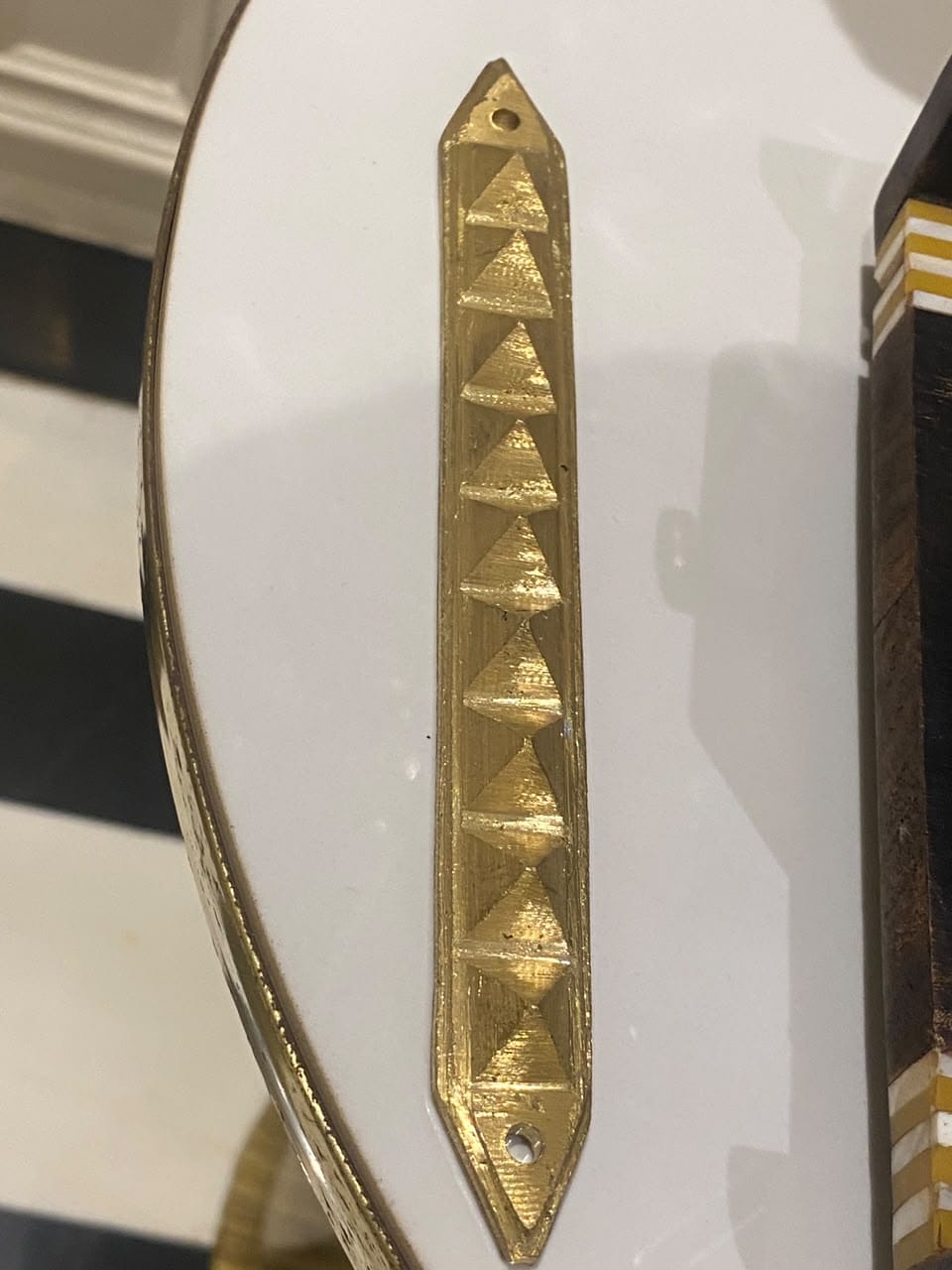 Customer photo review of 9 Pyramid Strips – Vastu Remedy for Door Threshold & Toilet Energy Blocking | Copper/Brass/Lead Door Corrections | 7 inches