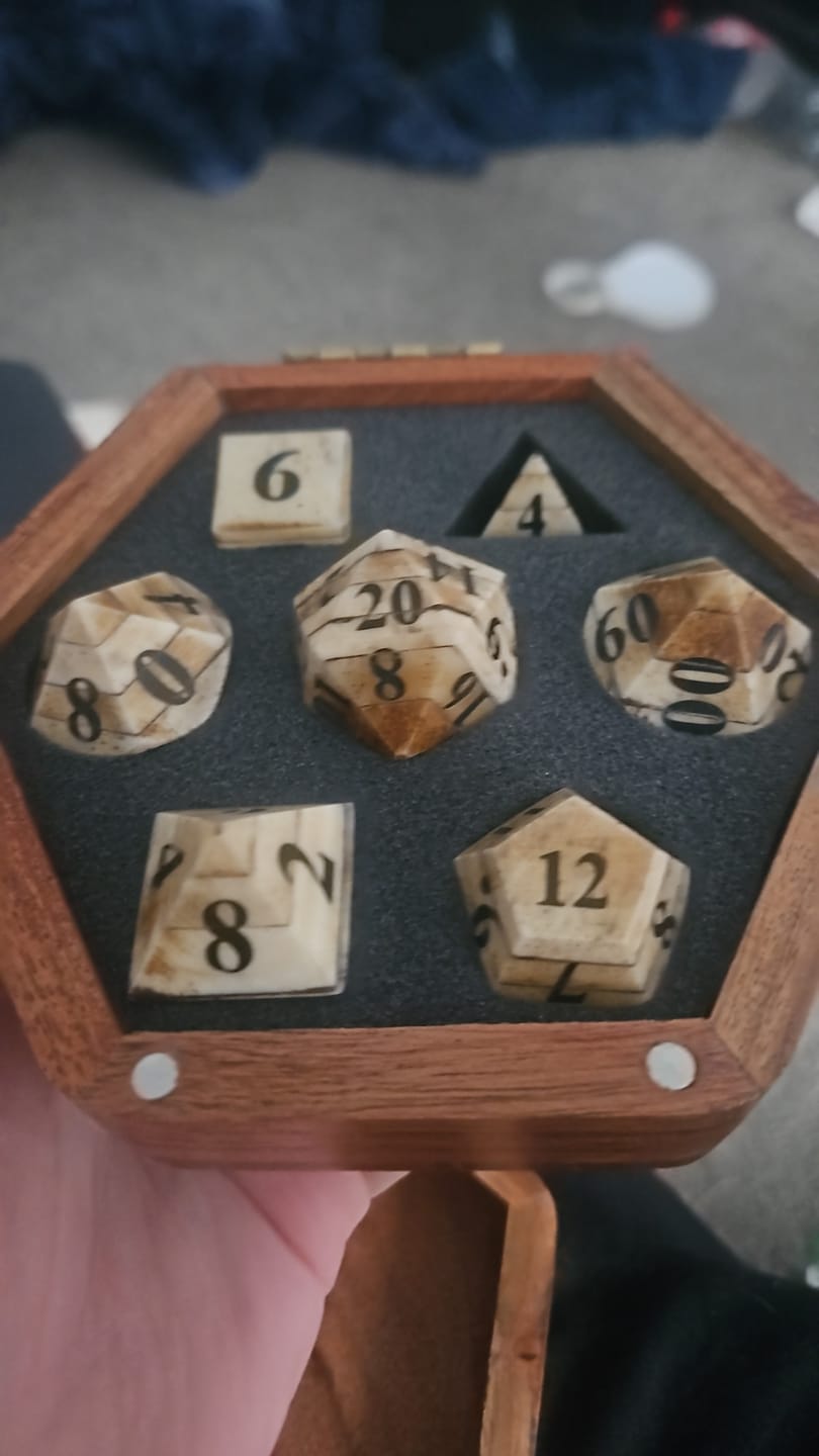 Customer photo review of Jergal’s Horde – 7-Piece Oversized Bone D&D Dice Set