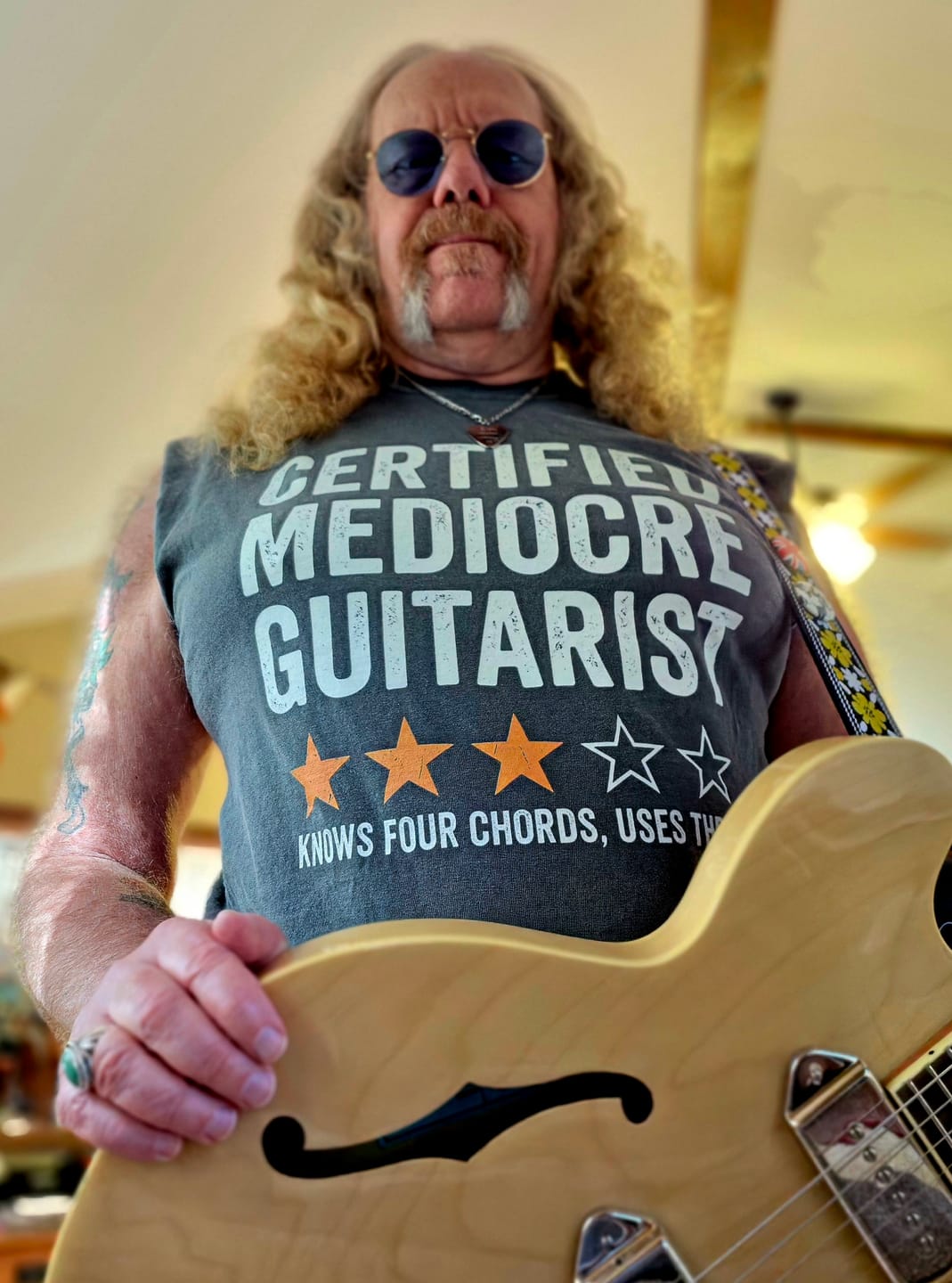 Customer photo review of Mediocre Guitarist T-shirt