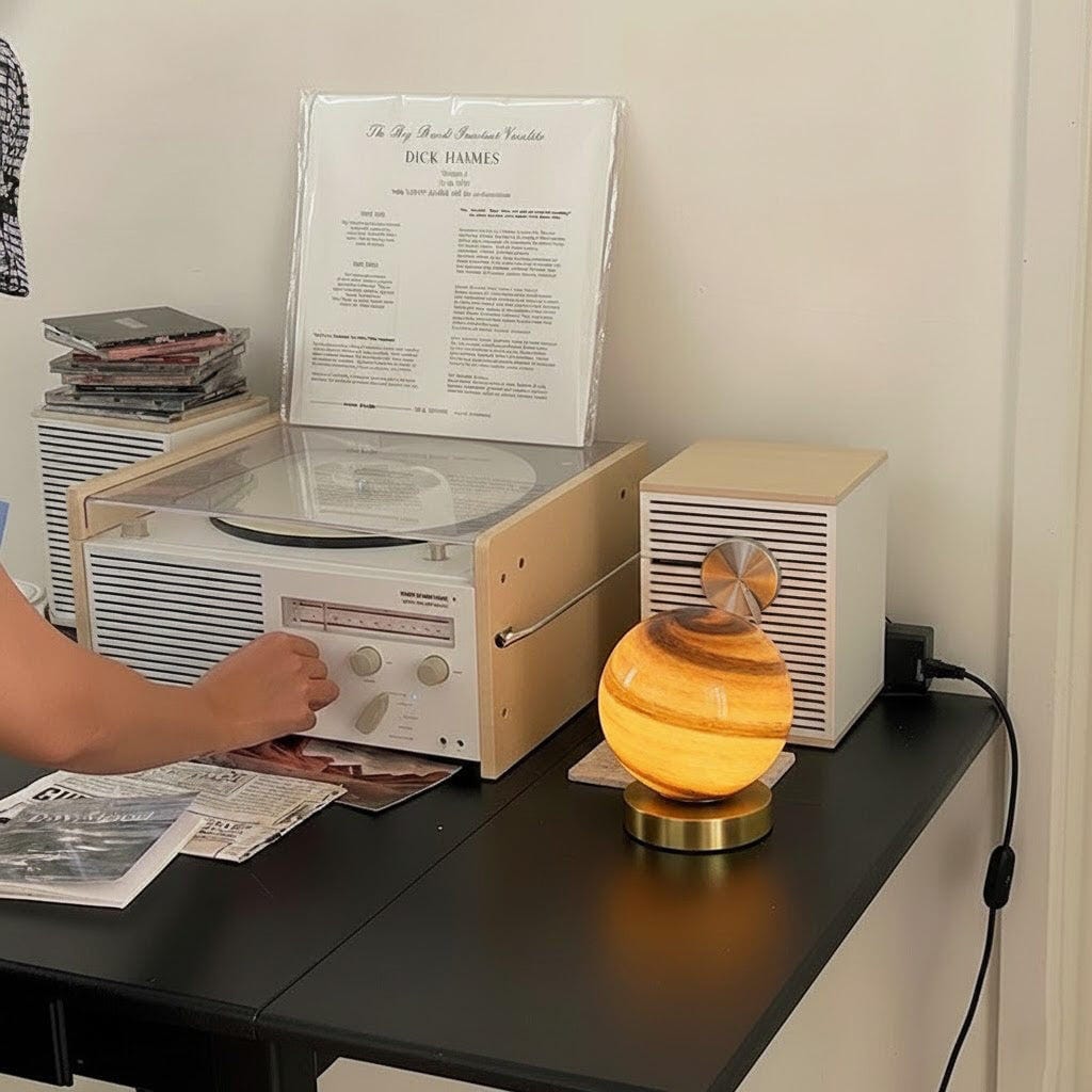 Customer photo review of Swirl Glass Sphere Table Lamp, Brass Base, Bedside Lamp