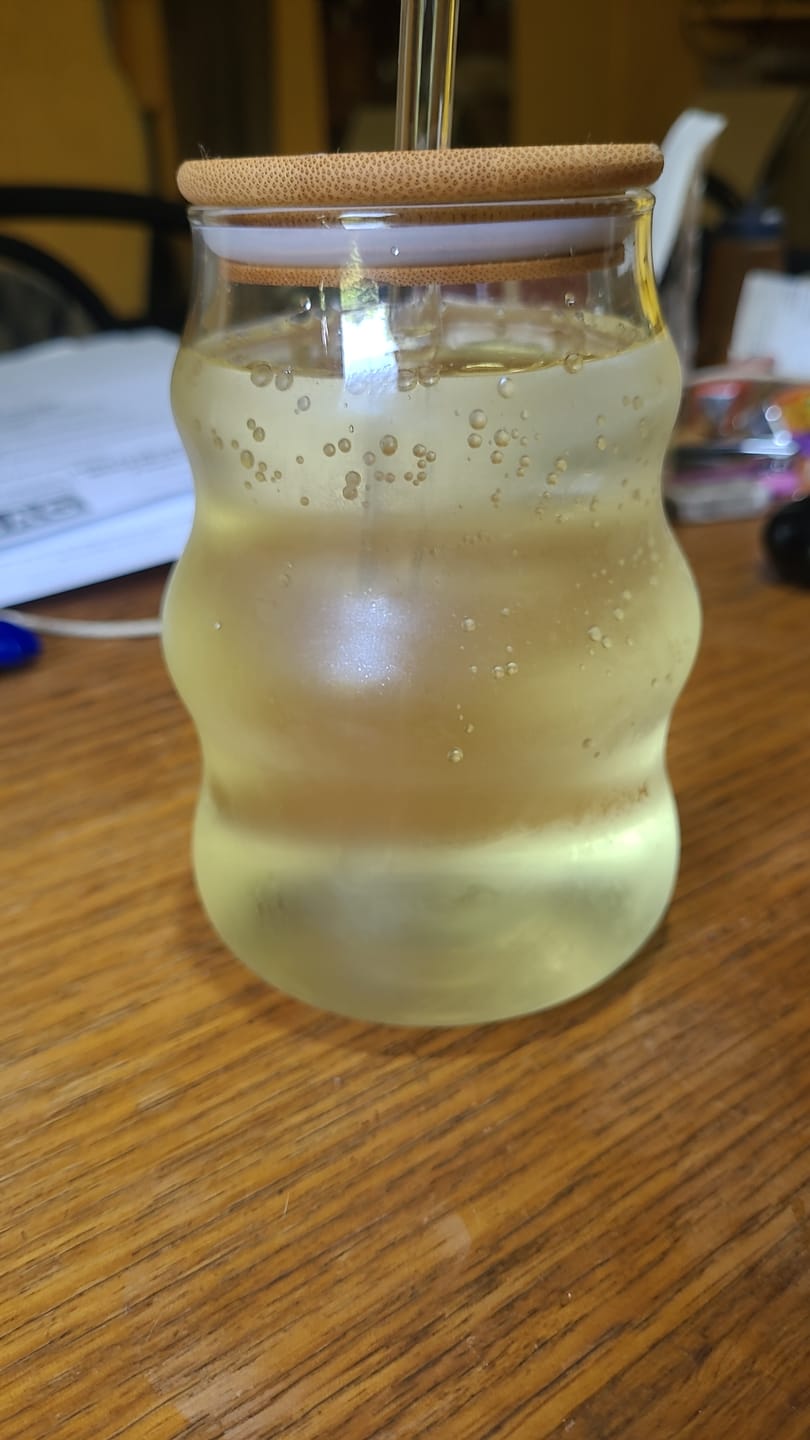 Customer photo review of Vaso de Vidrio Ondulado con Tapa de Bambú y Bombilla 400ml