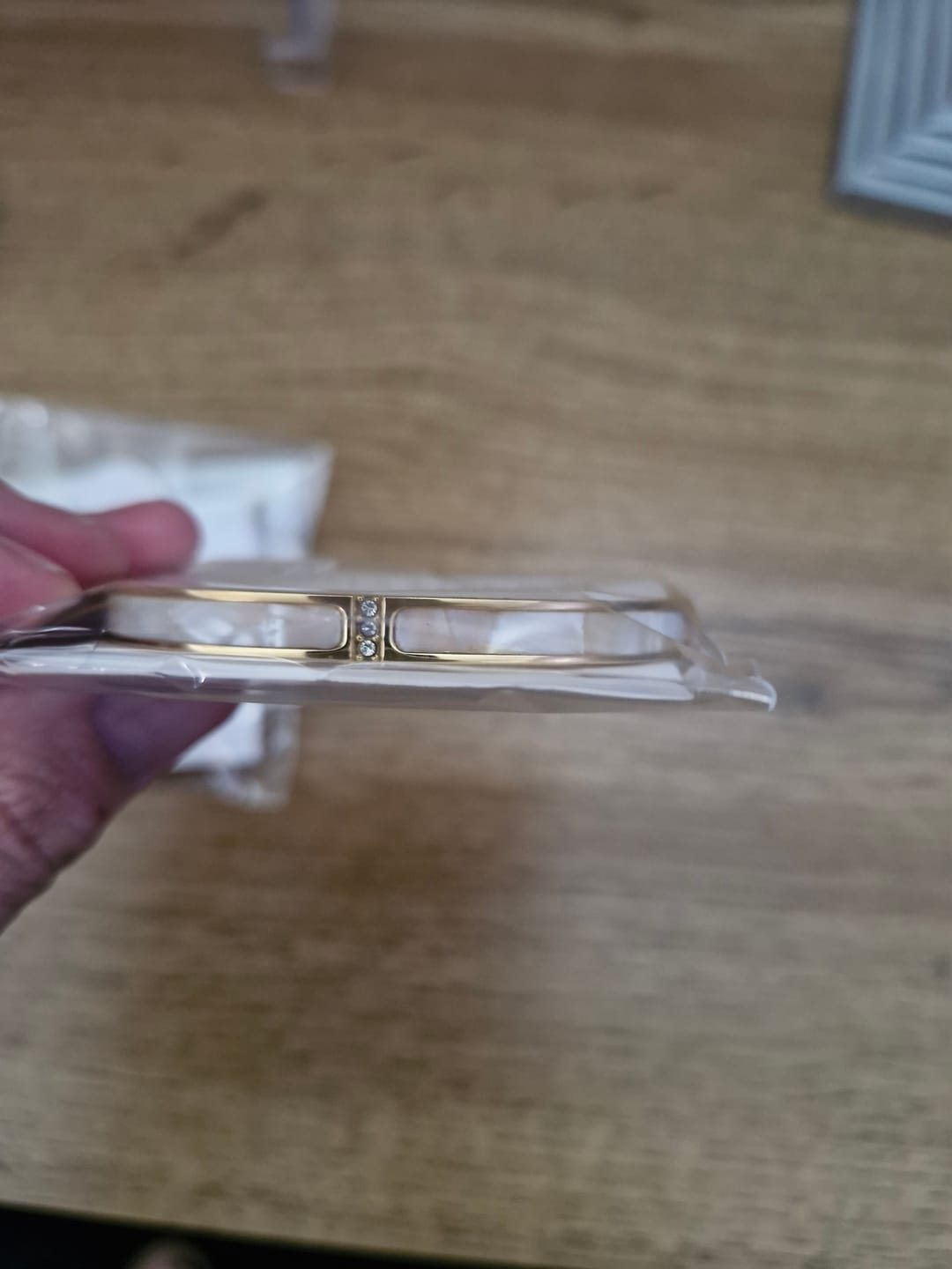 Customer photo review of White Sahara Gold Bangle