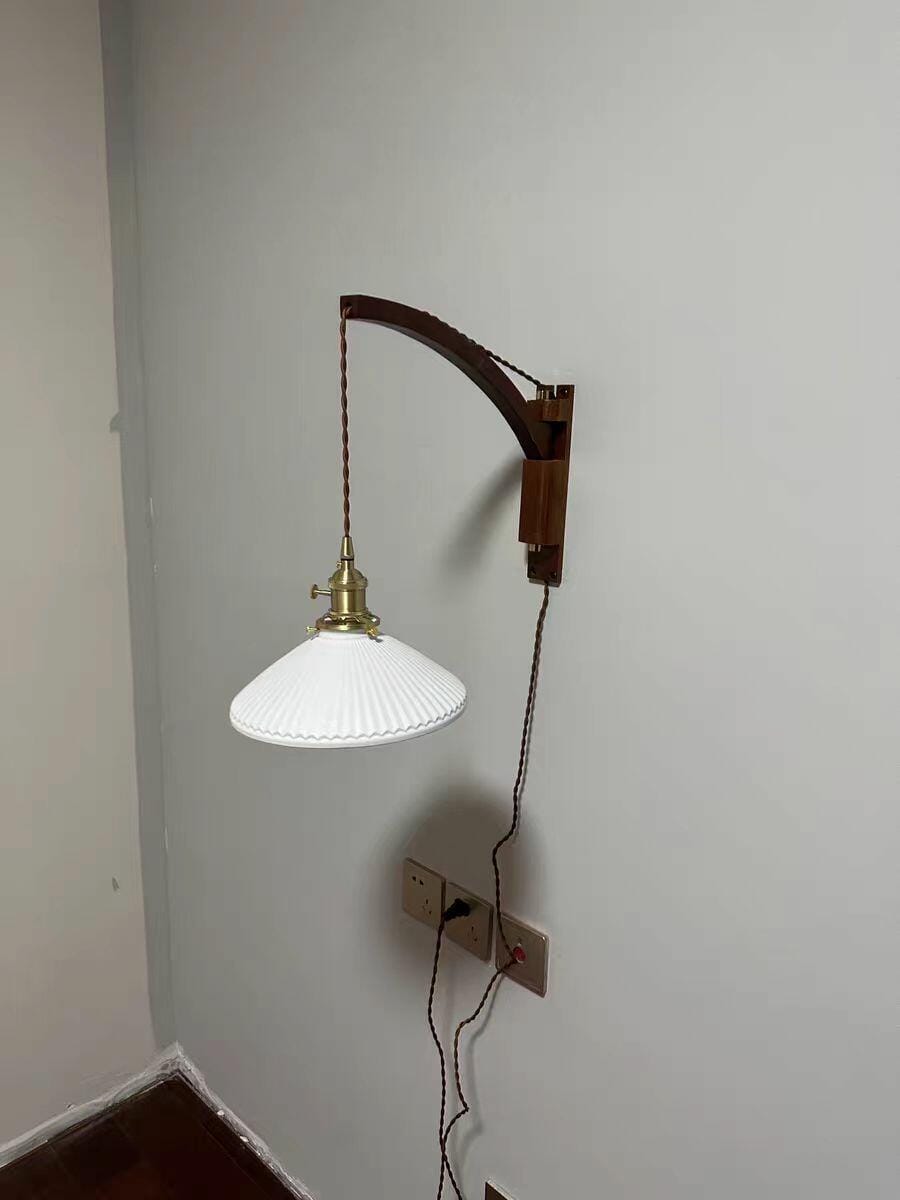 Customer photo review of Swing Arm Wall Light, Wood and Brass, Plug In Wall Sconce