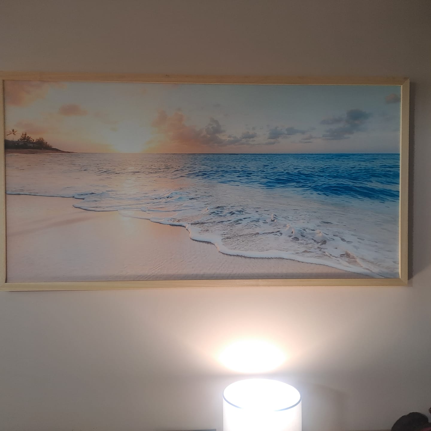 Customer photo review of Tramonto con mare piatto