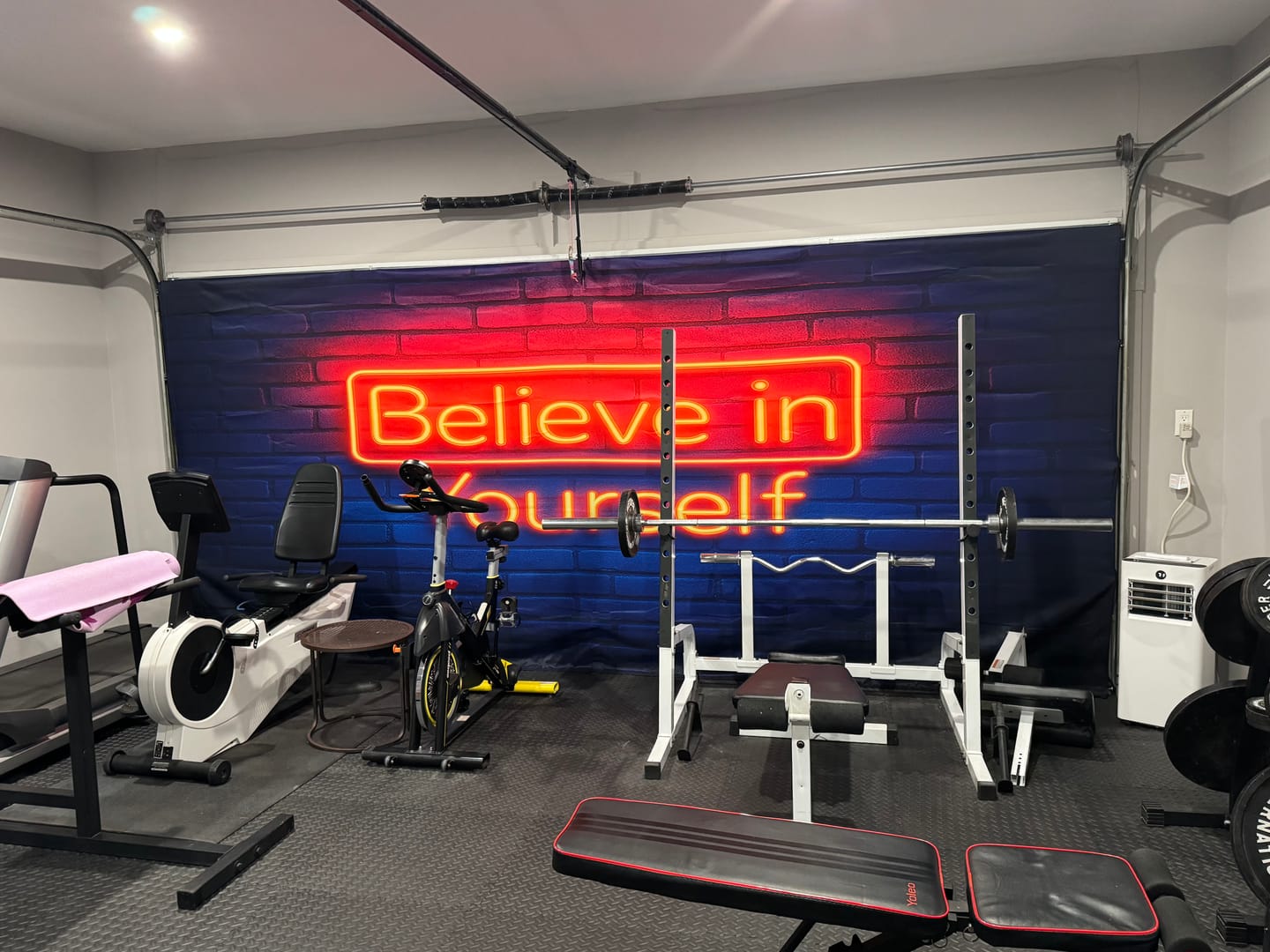 Customer photo review of Neon Believe – Motivational Garage Door Cover