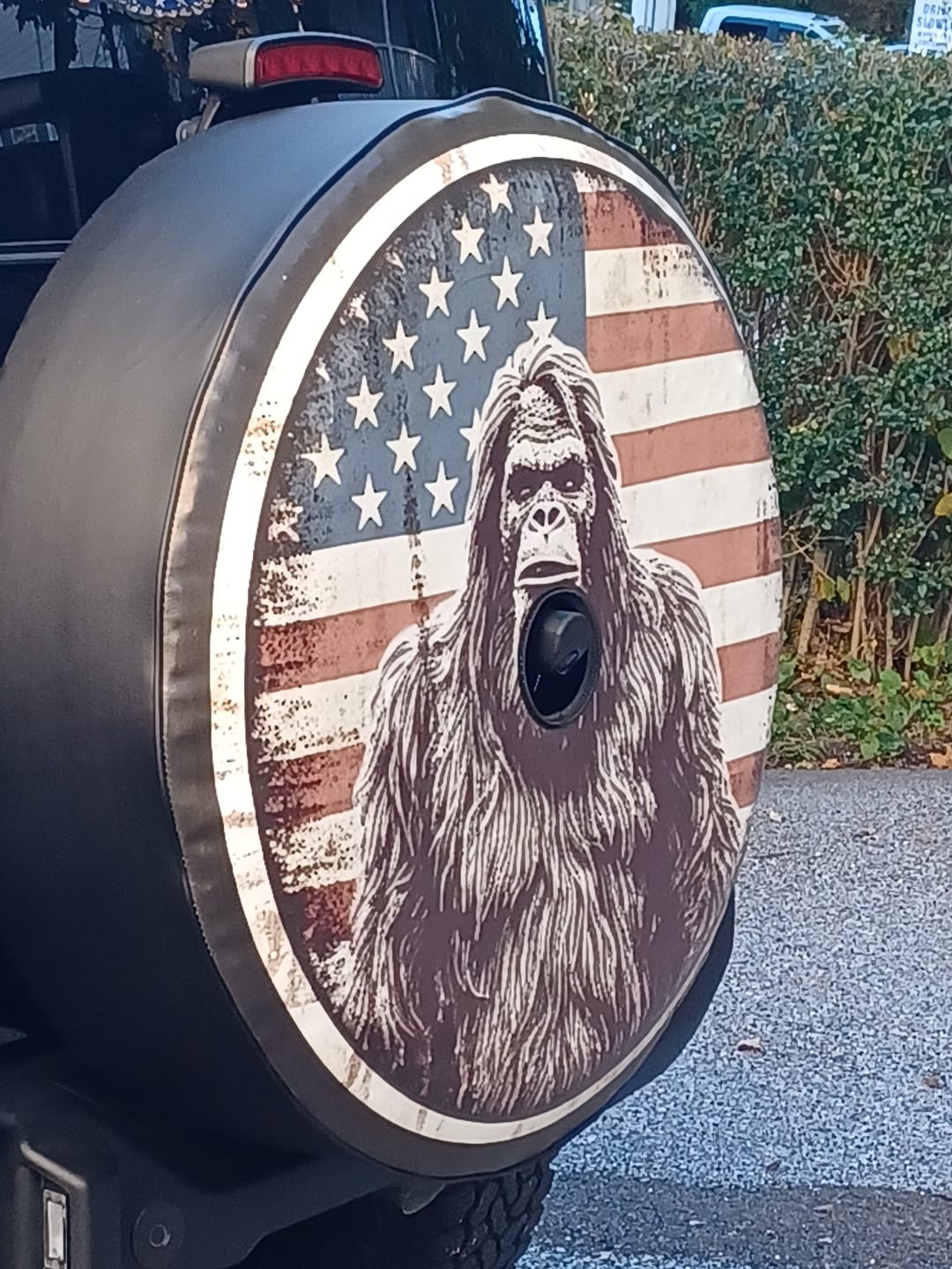 Customer photo review of American Flag  Bigfoot Portrait - Sasquatch Spare Tire Cover for Bronco, RV, Jeep, Camper, Van