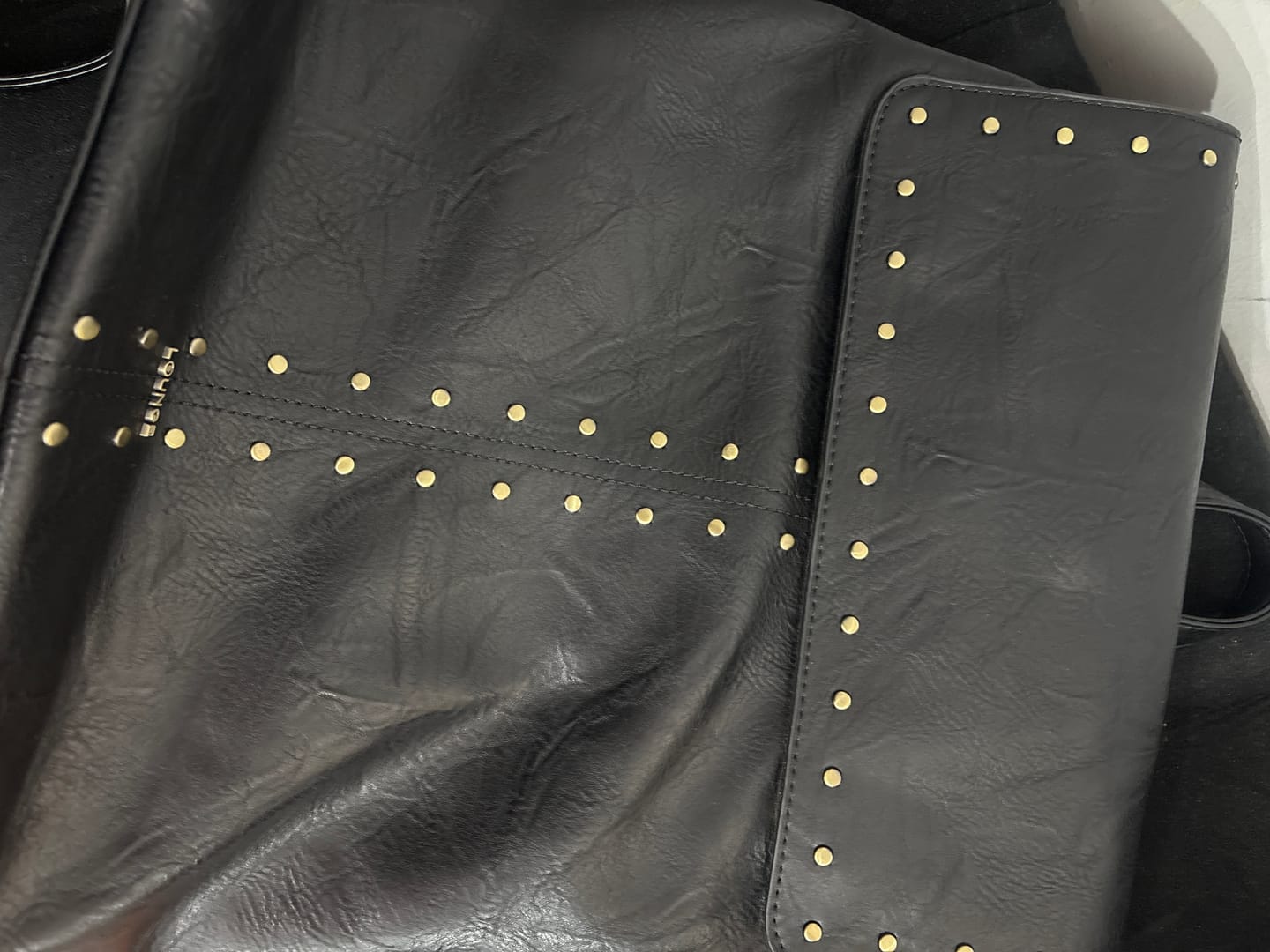 Customer photo review of Mochila Notebook Tachas