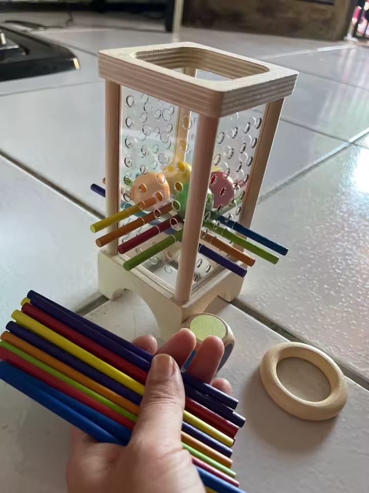 Customer photo review of Tour de bâtonnets en bois Montessori