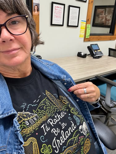 Customer's I'd Rather Be In Ireland T-Shirt featuring a black shirt with detailed Celtic illustrations worn by reviewer