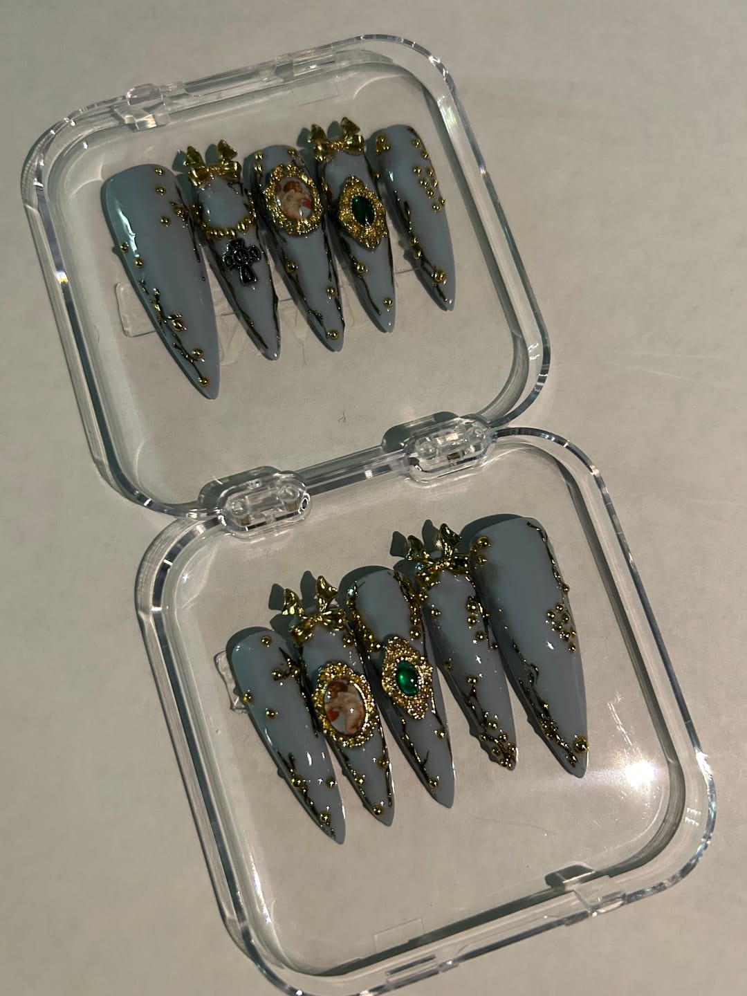 Customer photo review of Bold Spark Metallic Stiletto Press-On Nails