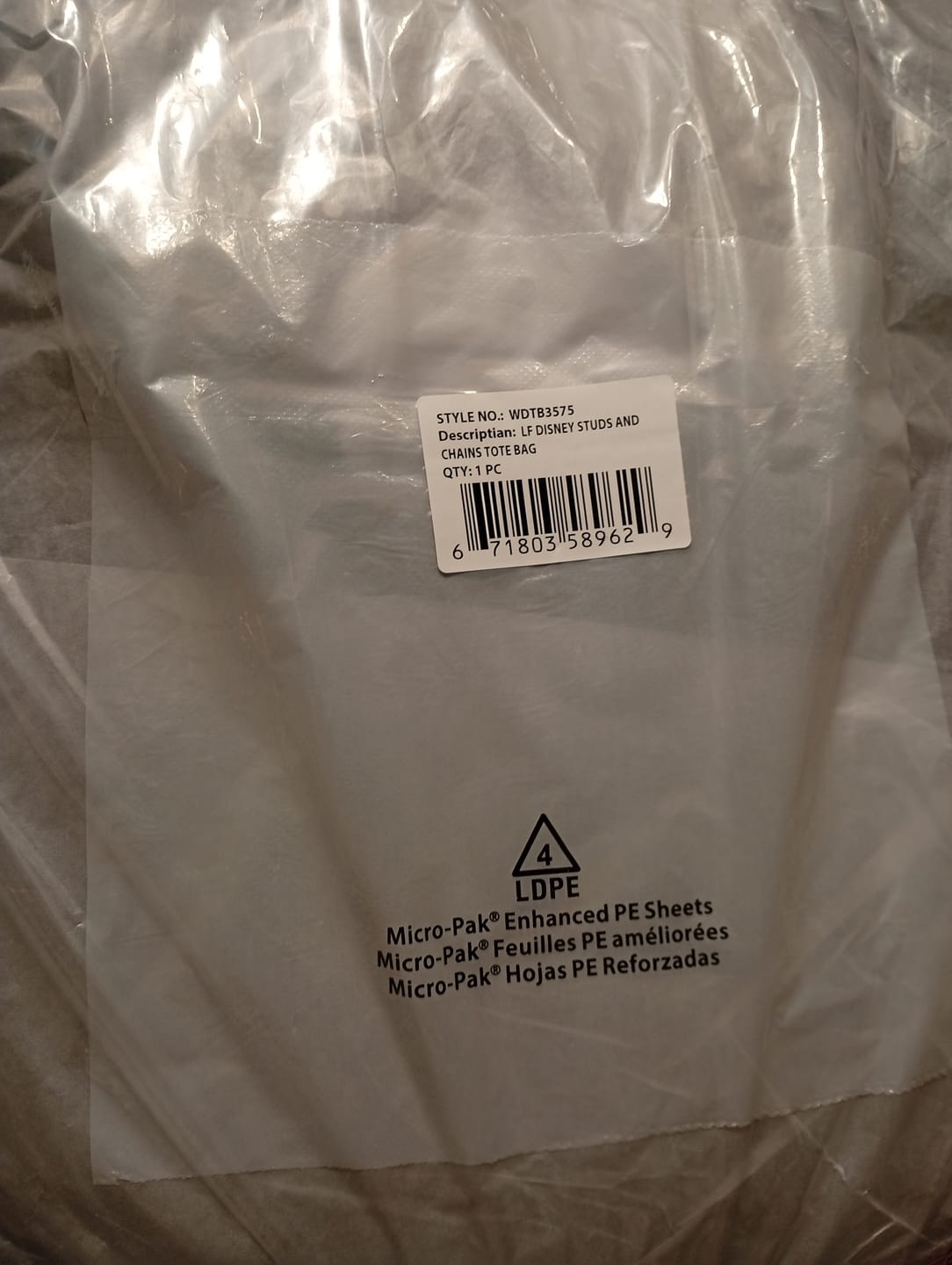 Customer photo review of Loungefly Disney Minnie Mouse Studs & Chains Tote Bag