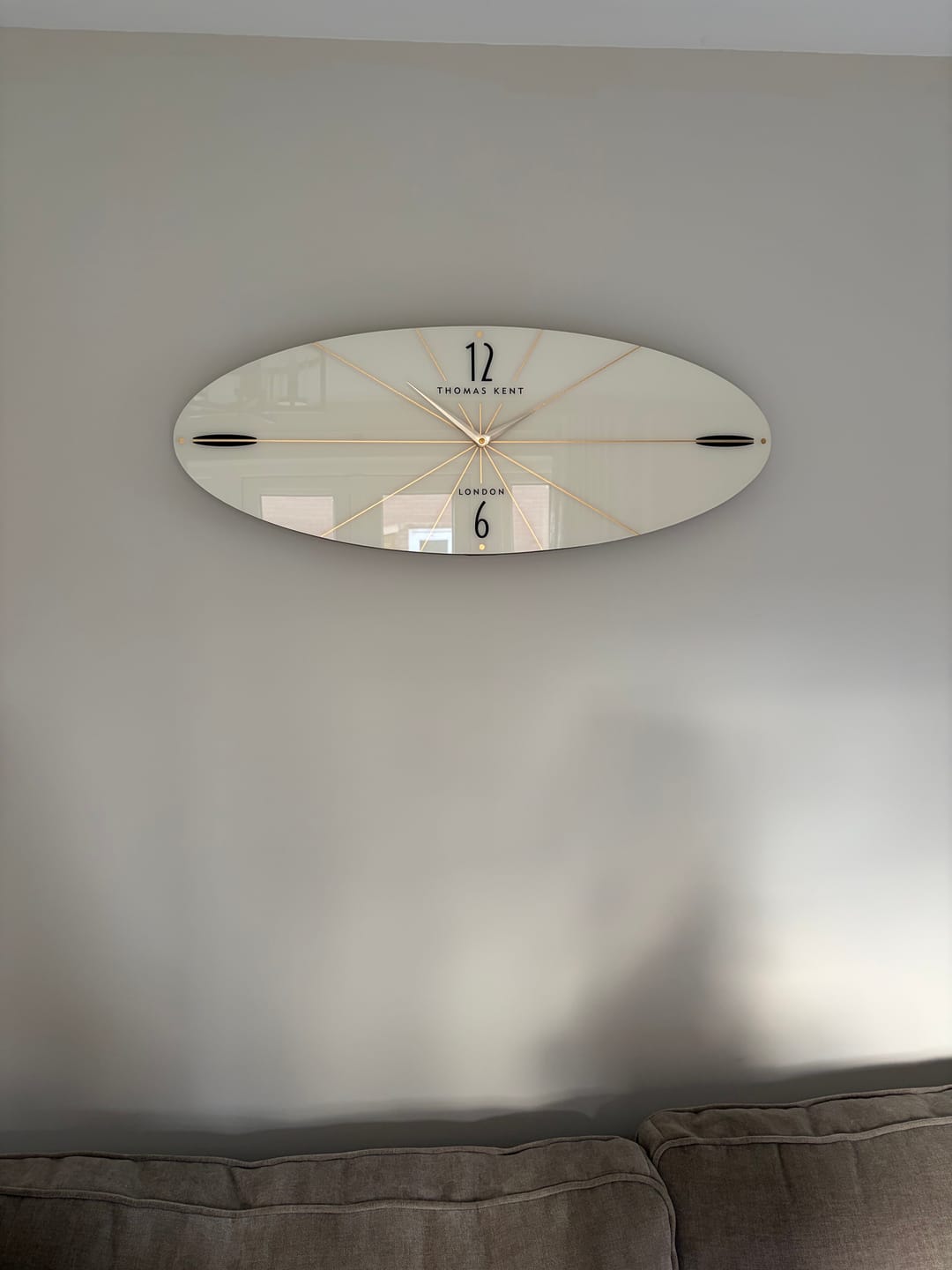 Customer photo review of Thomas Kent Greenwich Ellipse Wall Clock Snow White Delivers Within 3-5 Business Days