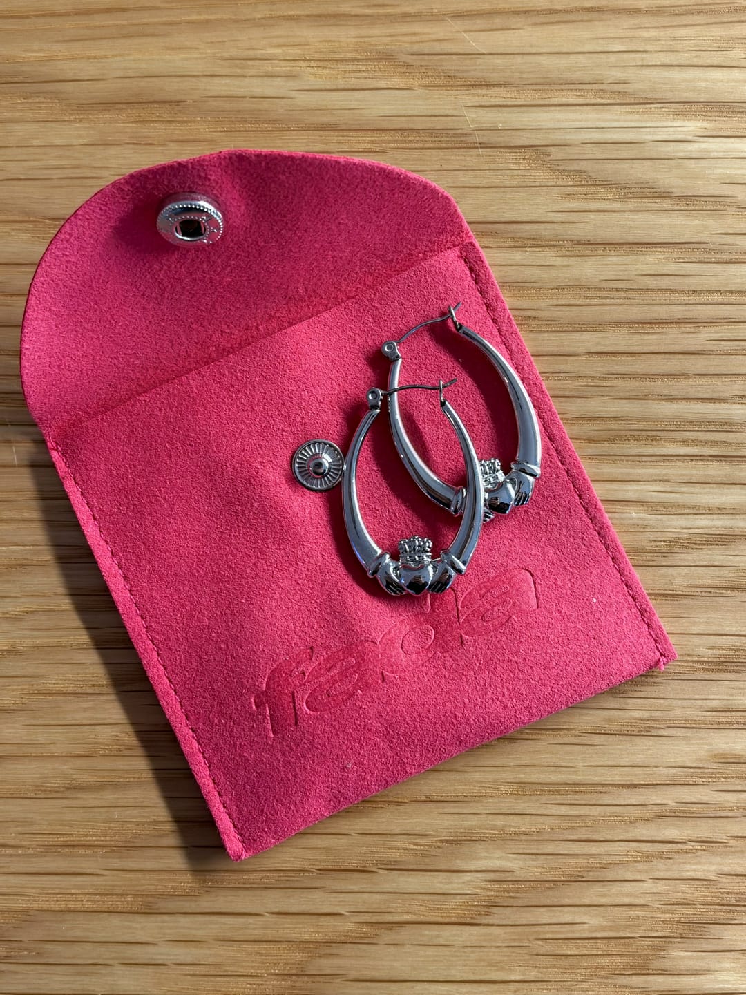Customer photo review of Claddagh Hoop Earrings