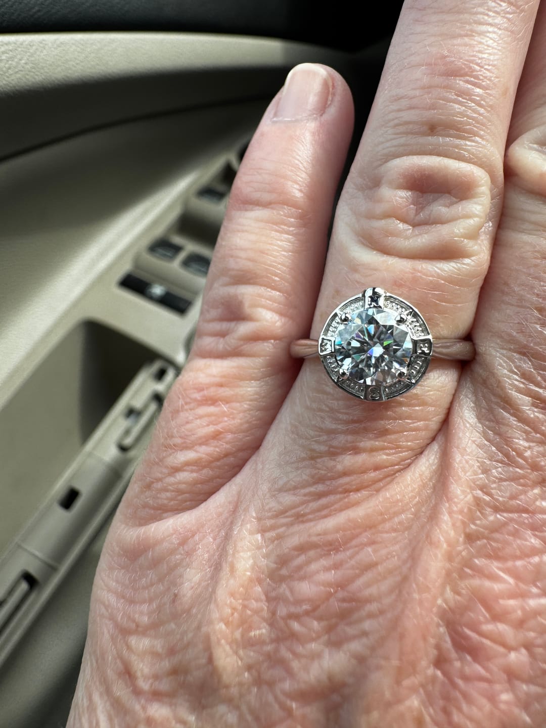 Customer photo review of North Star Halo Compass Solitaire Moissanite Engagement Ring