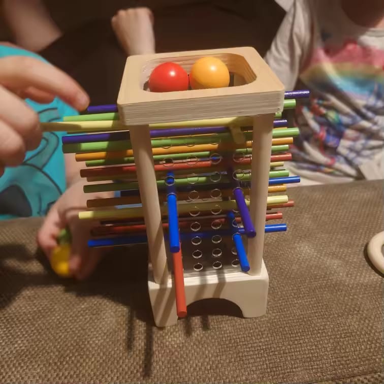 Customer photo review of Tour de bâtonnets en bois Montessori