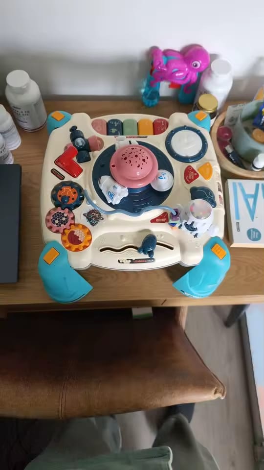Customer photo review of Table musicale pour bébé