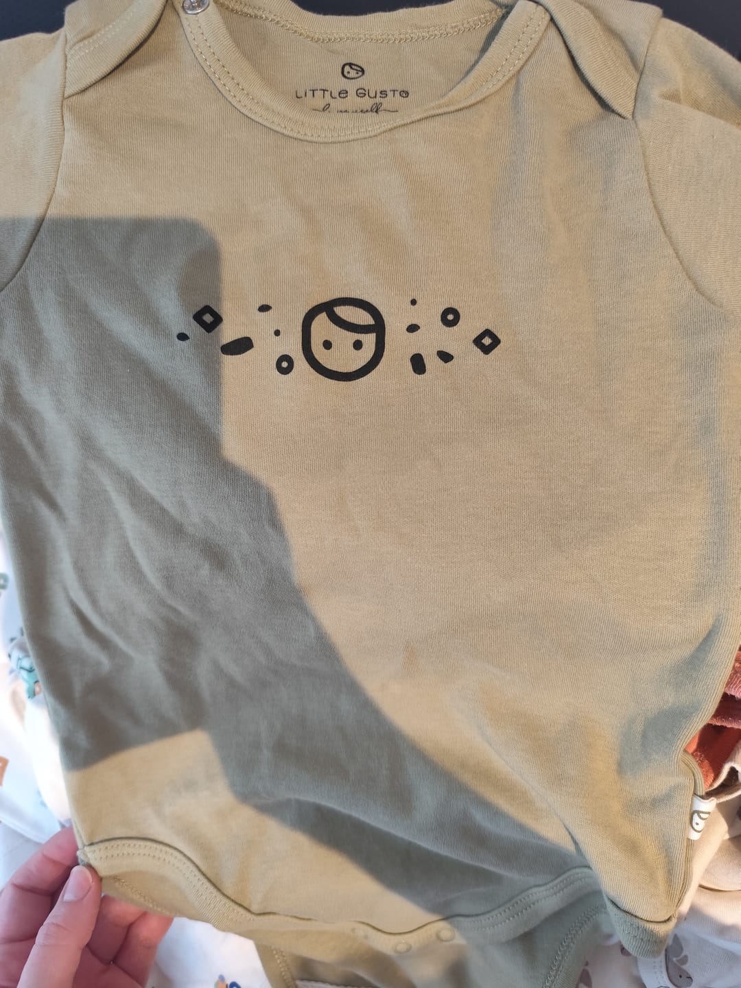 Customer photo review of Uzun Kollu Ayarlanabilir Çıtçıtlı Zıbın Haki Organik Pamuk Planet Gusto
