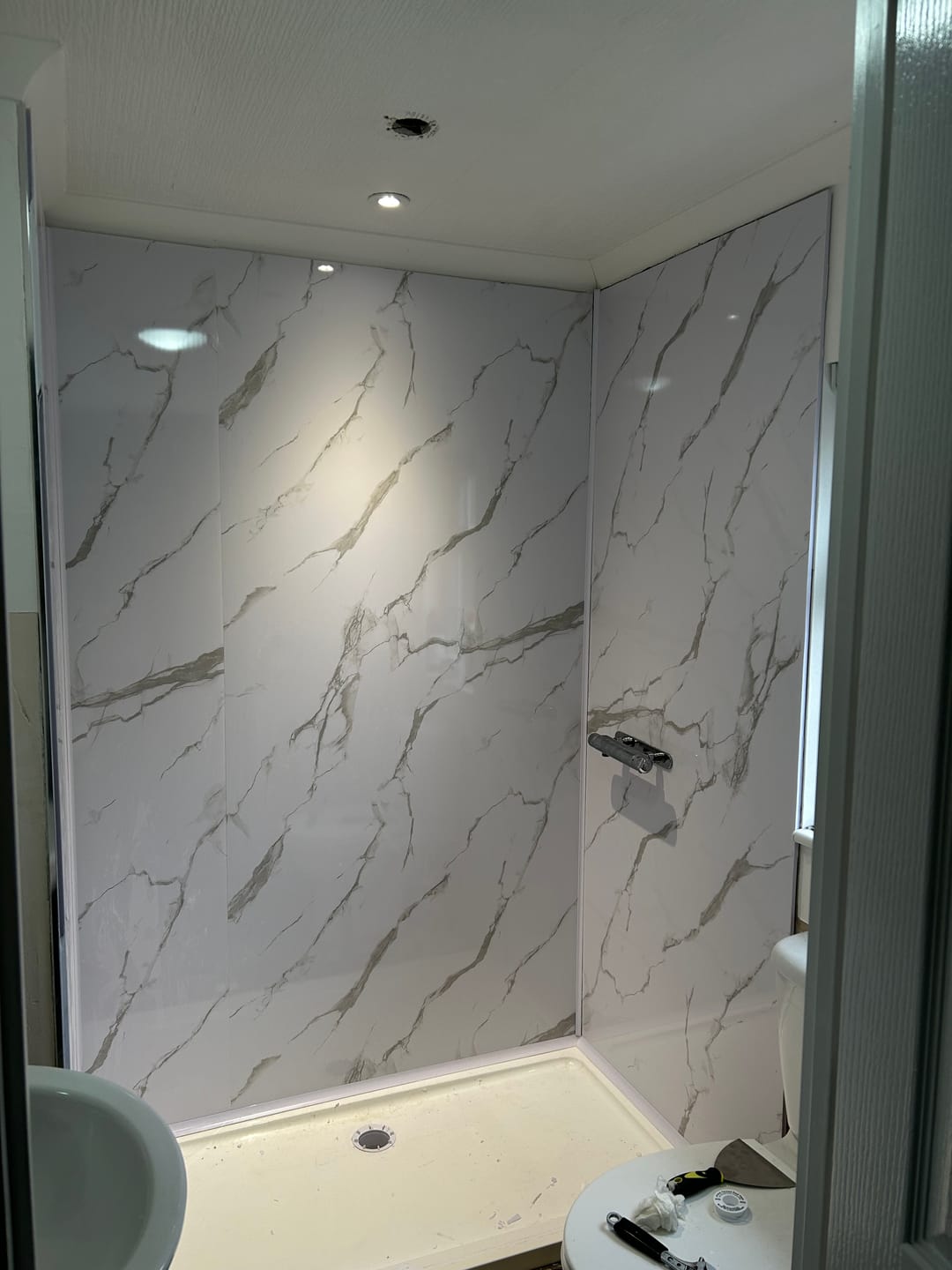 Customer photo review of Premium Carrara White Marble Gloss Shower Wall Panel - 1M x 2.4M