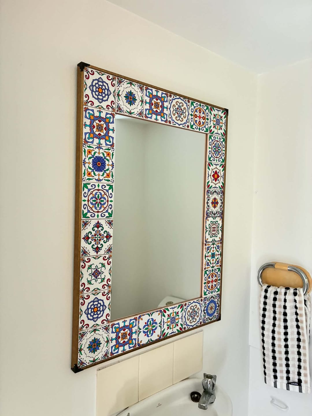 Customer photo review of Salomé Mediterranean Tile Wall Mirror, Hand-Painted Maiolica Frame