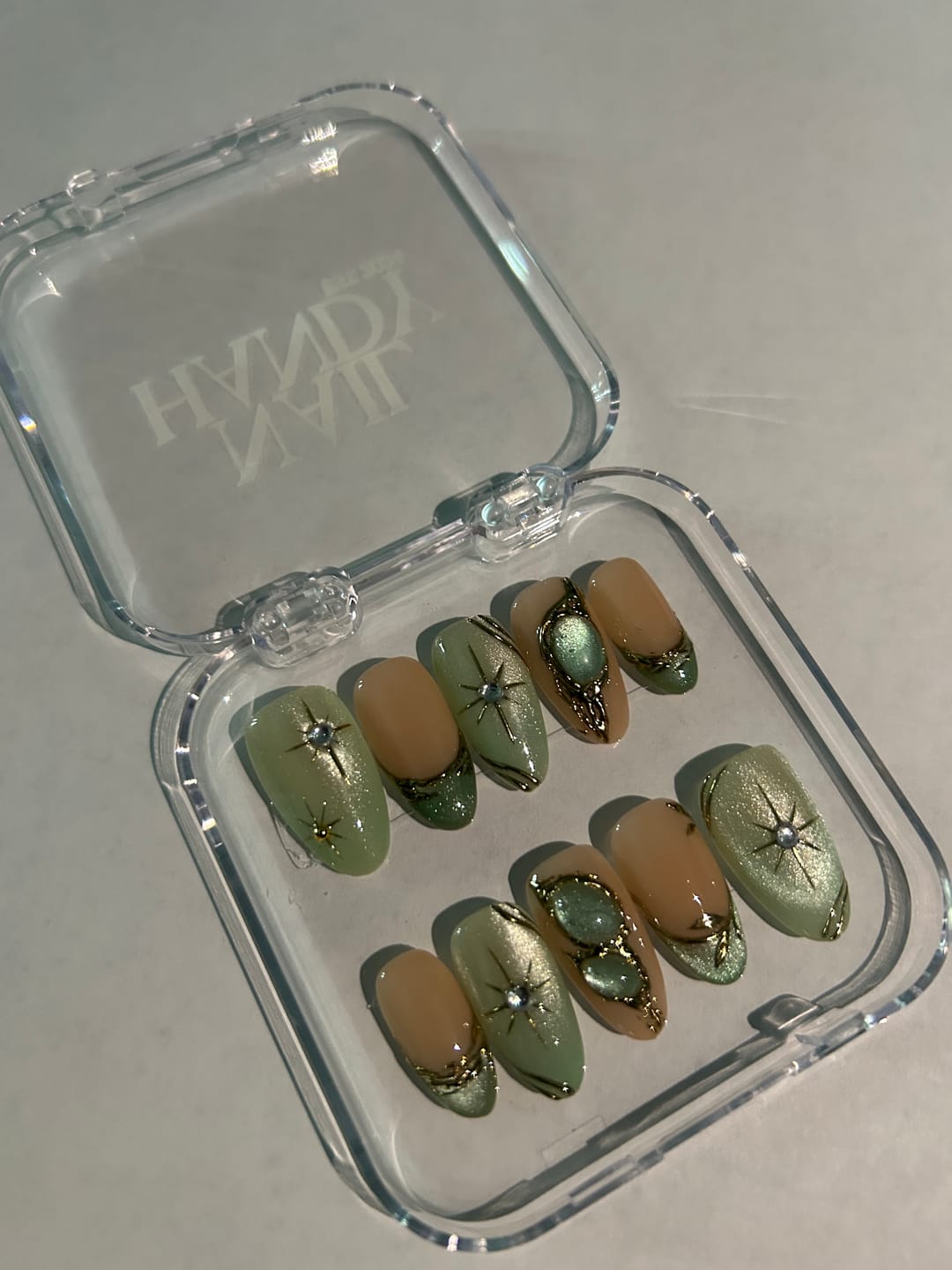 Customer photo review of Sage Aura Cat-Eye Press-On Nails
