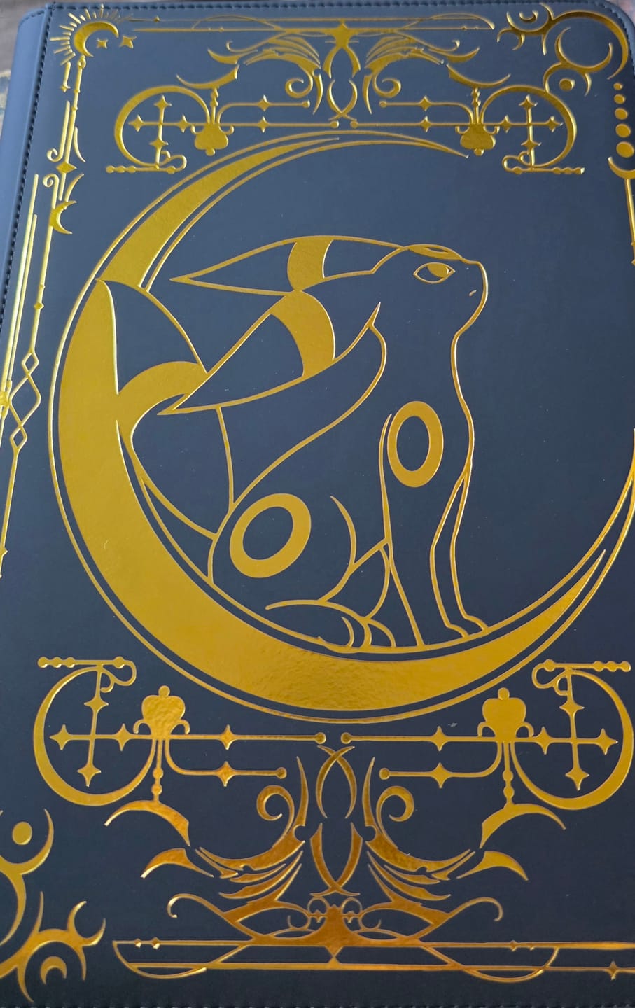 Customer photo review of the Lunar Shadow 9-Pocket Trading Card Binder